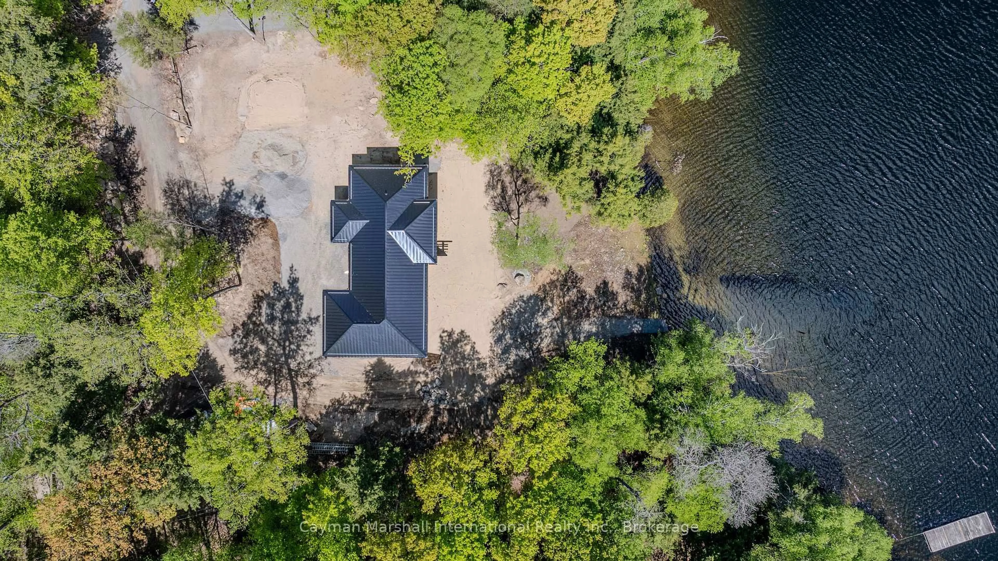 A pic from outside/outdoor area/front of a property/back of a property/a pic from drone, water/lake/river/ocean view for 1151 Elder Rd #2, Lake of Bays Ontario P0A 1H0