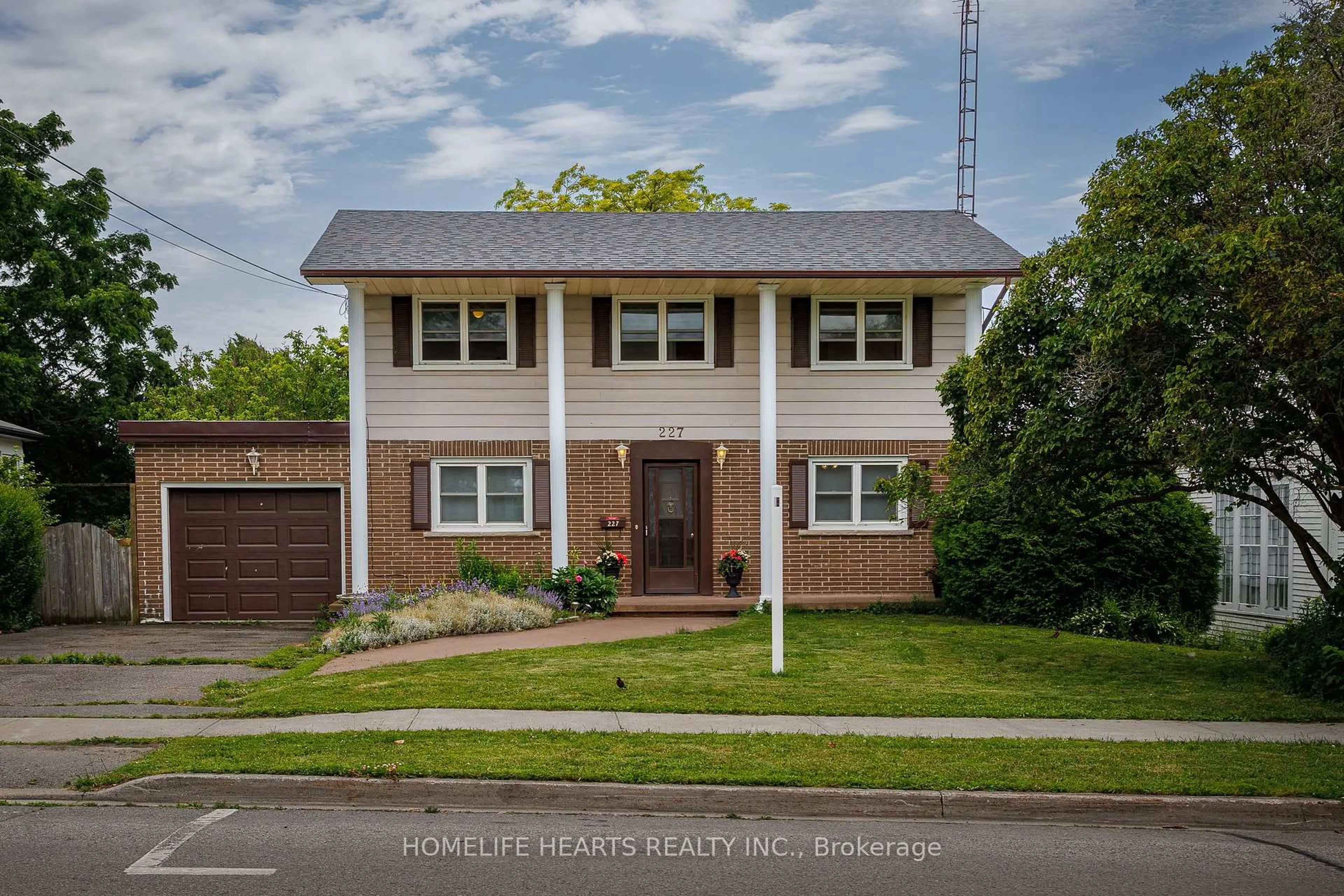 Home with brick exterior material, street for 227 Queen St, Cobourg Ontario K9A 1N4