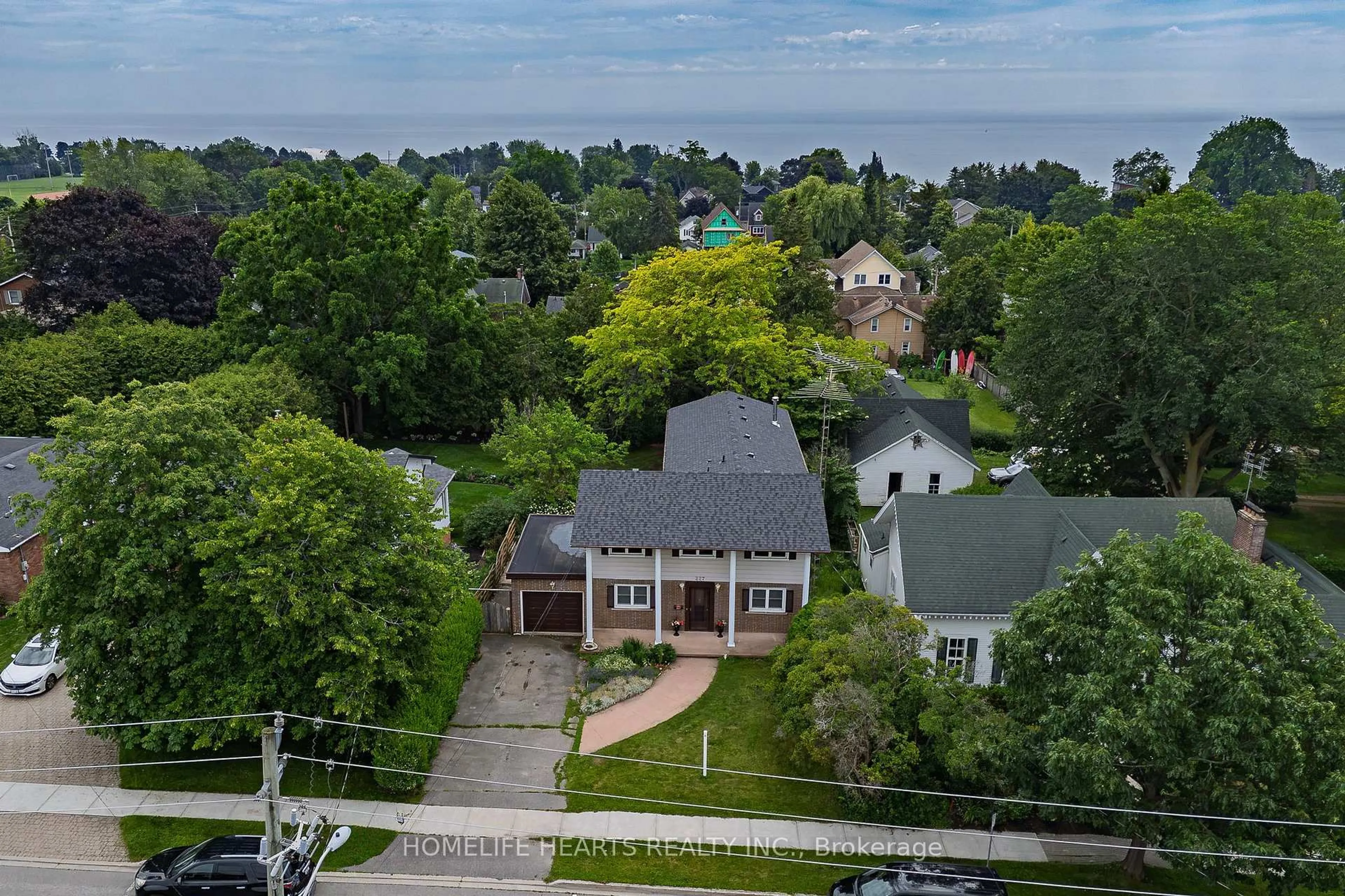 A pic from outside/outdoor area/front of a property/back of a property/a pic from drone, street for 227 Queen St, Cobourg Ontario K9A 1N4