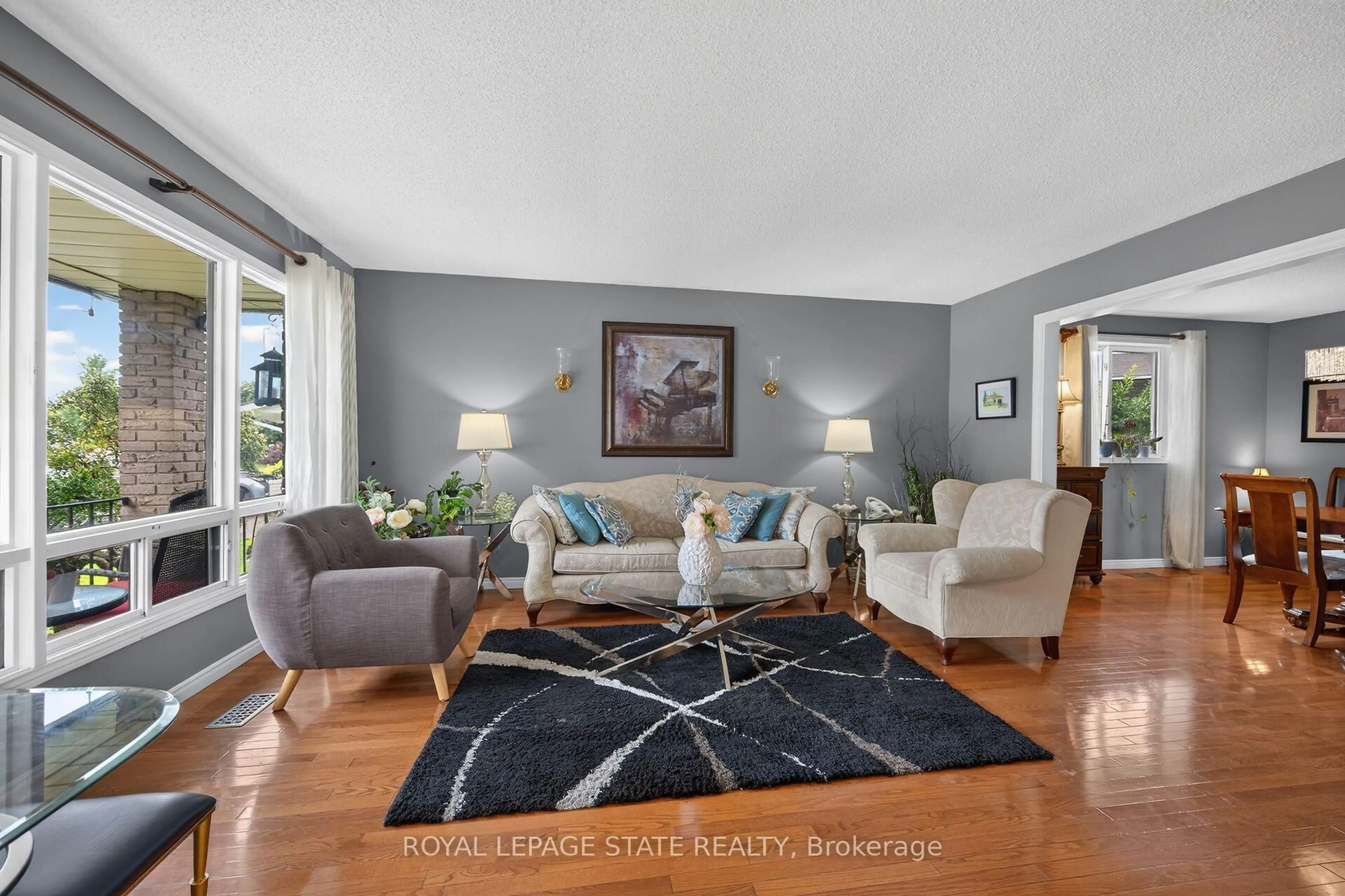 Living room with furniture, unknown for 408 Rexford Dr, Hamilton Ontario L8W 2M6