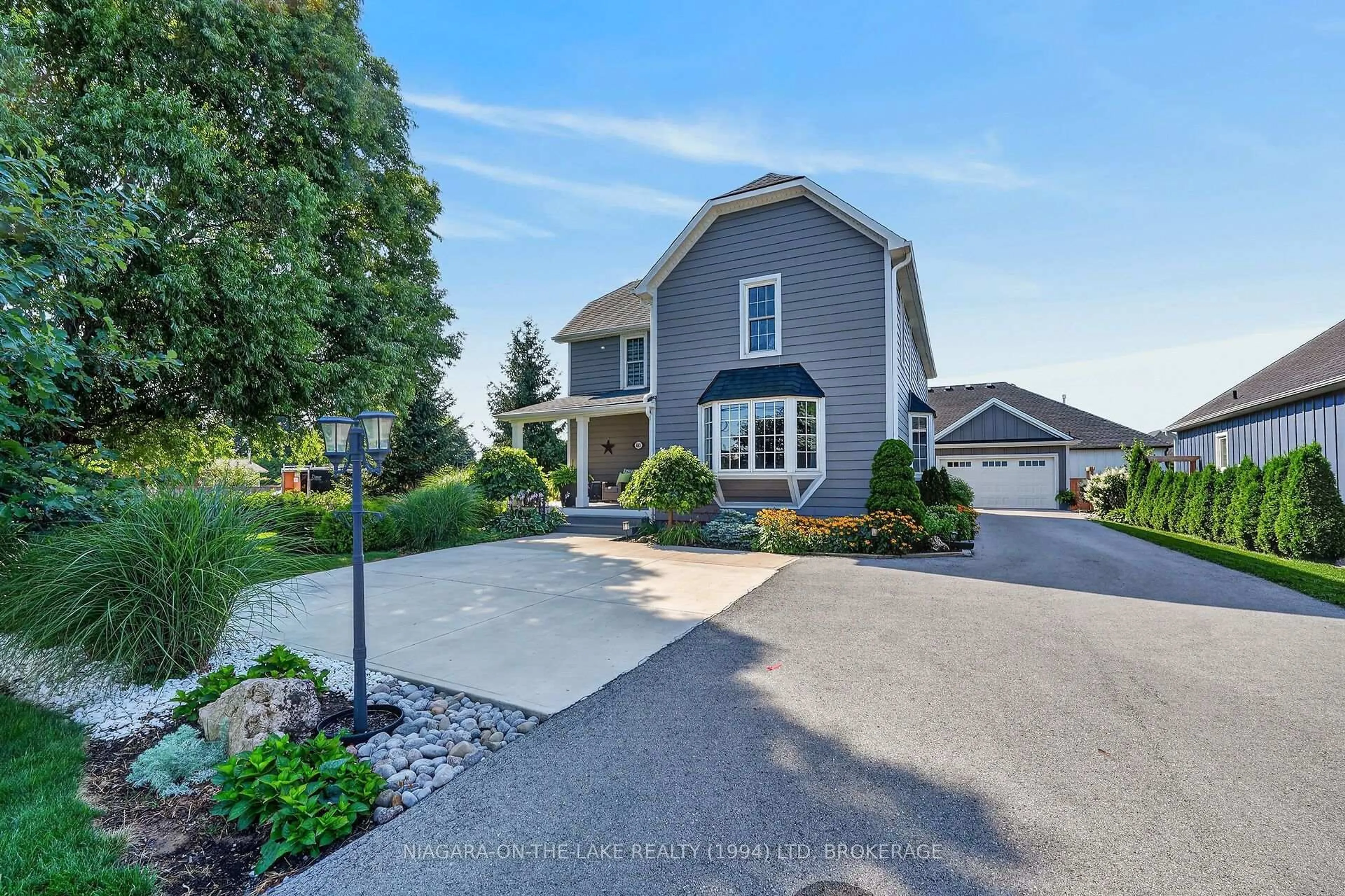 Home with vinyl exterior material, street for 445 LINE 2 Rd, Niagara-on-the-Lake Ontario L0S 1J0