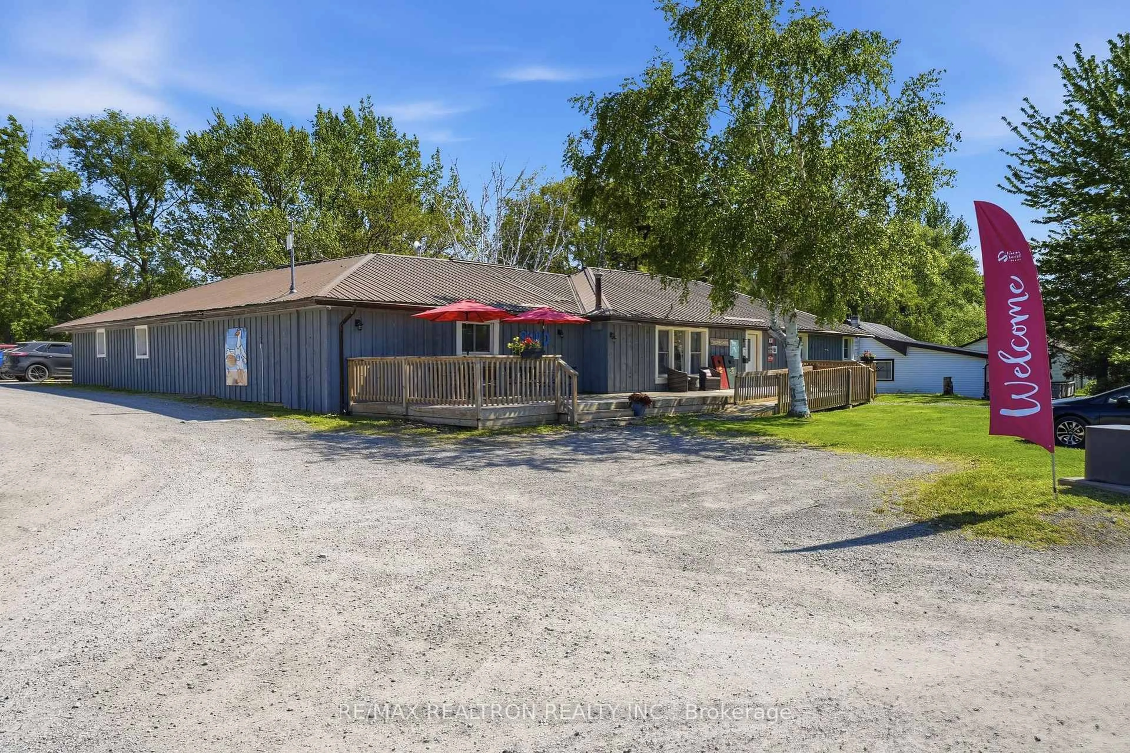 A pic from outside/outdoor area/front of a property/back of a property/a pic from drone, street for 486 County Rd 18 Rd, Prince Edward County Ontario K0K 1P0