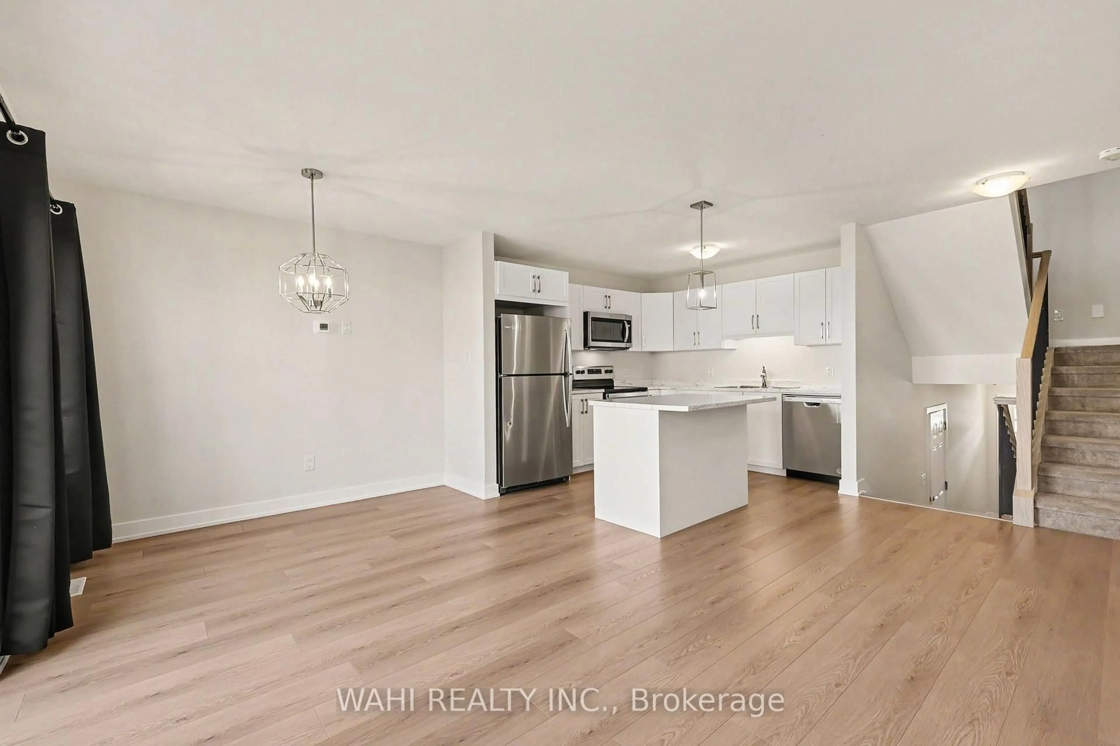 Open concept kitchen, wood/laminate floor for 65 Staples Blvd, Smiths Falls Ontario K7A 0B8