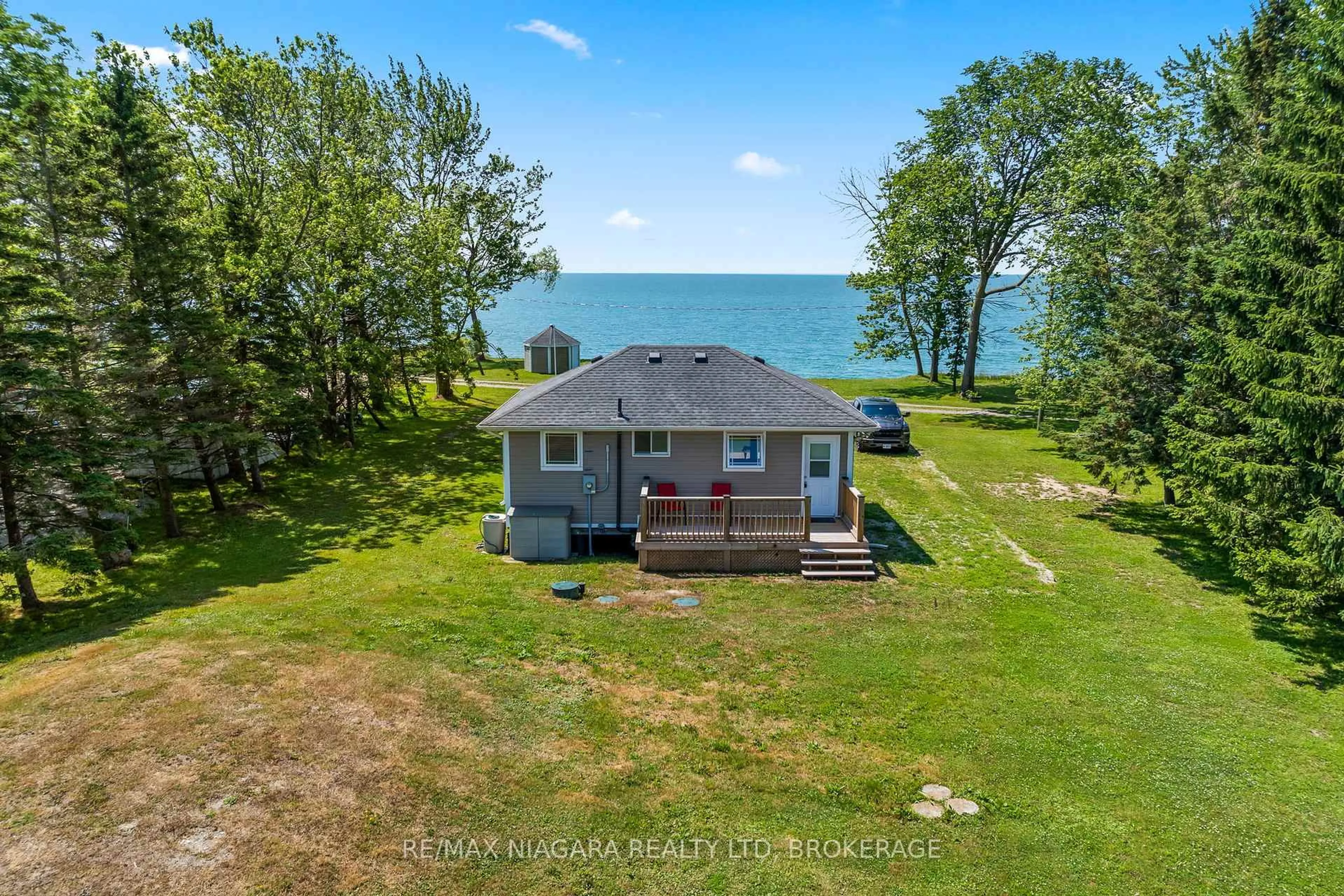 A pic from outside/outdoor area/front of a property/back of a property/a pic from drone, water/lake/river/ocean view for 45 Erie Heights Line, Haldimand Ontario N0A 1K0