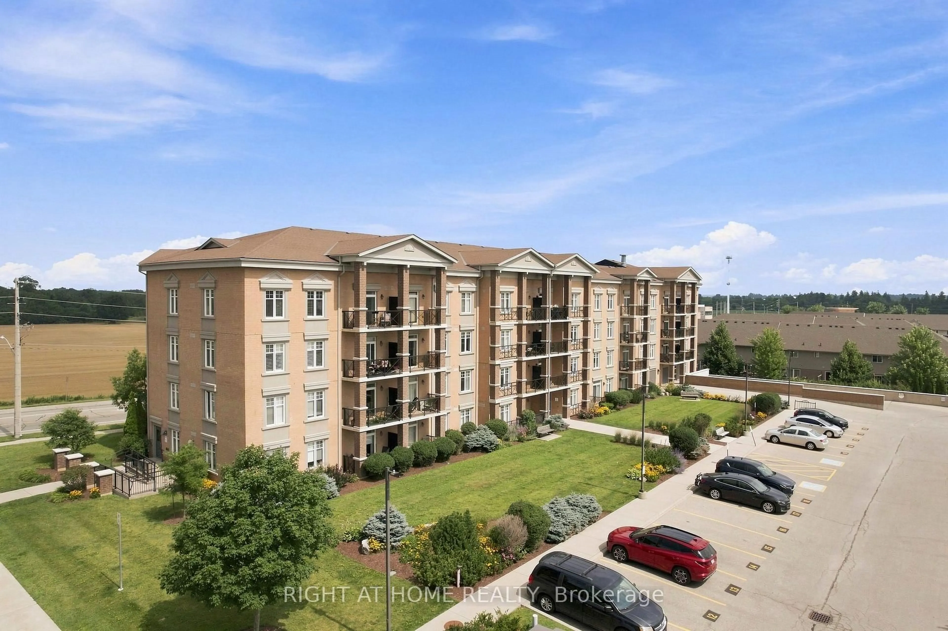 A pic from outside/outdoor area/front of a property/back of a property/a pic from drone, unknown for 2 Colonial Dr #201, Guelph Ontario N1L 0K8