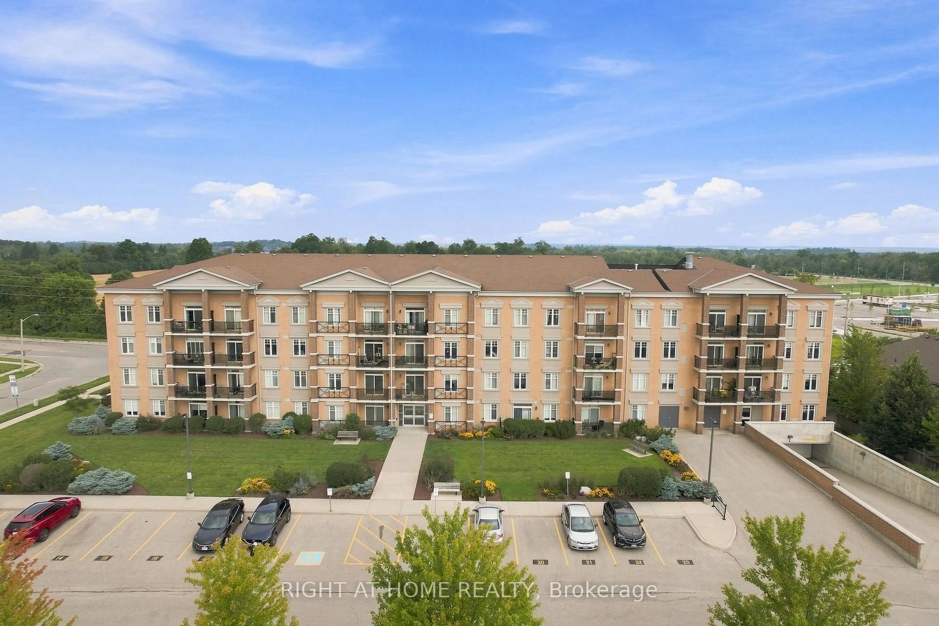 A pic from outside/outdoor area/front of a property/back of a property/a pic from drone, unknown for 2 Colonial Dr #201, Guelph Ontario N1L 0K8