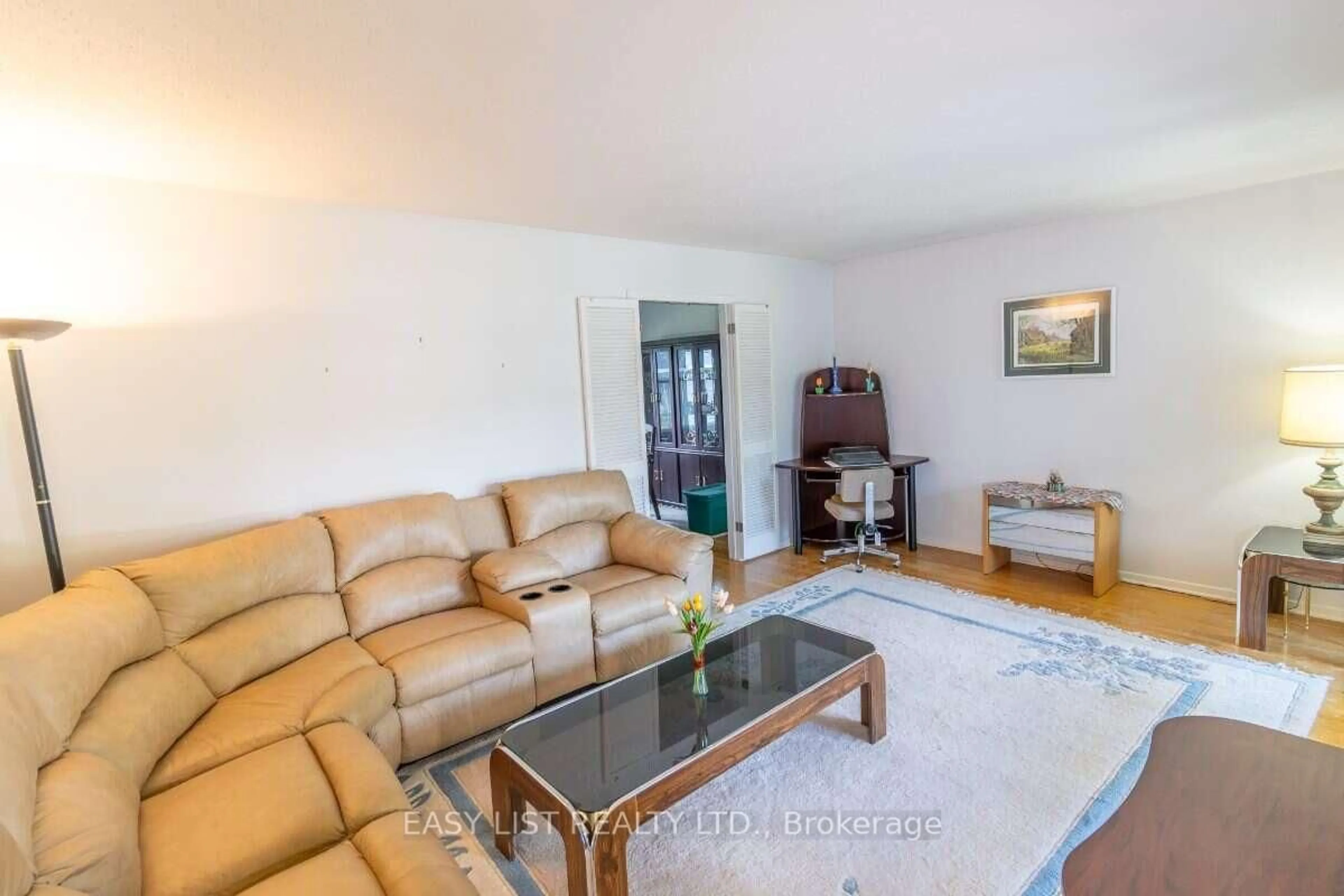 Living room with furniture, unknown for 1999 Garfield Ave, Ottawa Ontario K2C 0W7