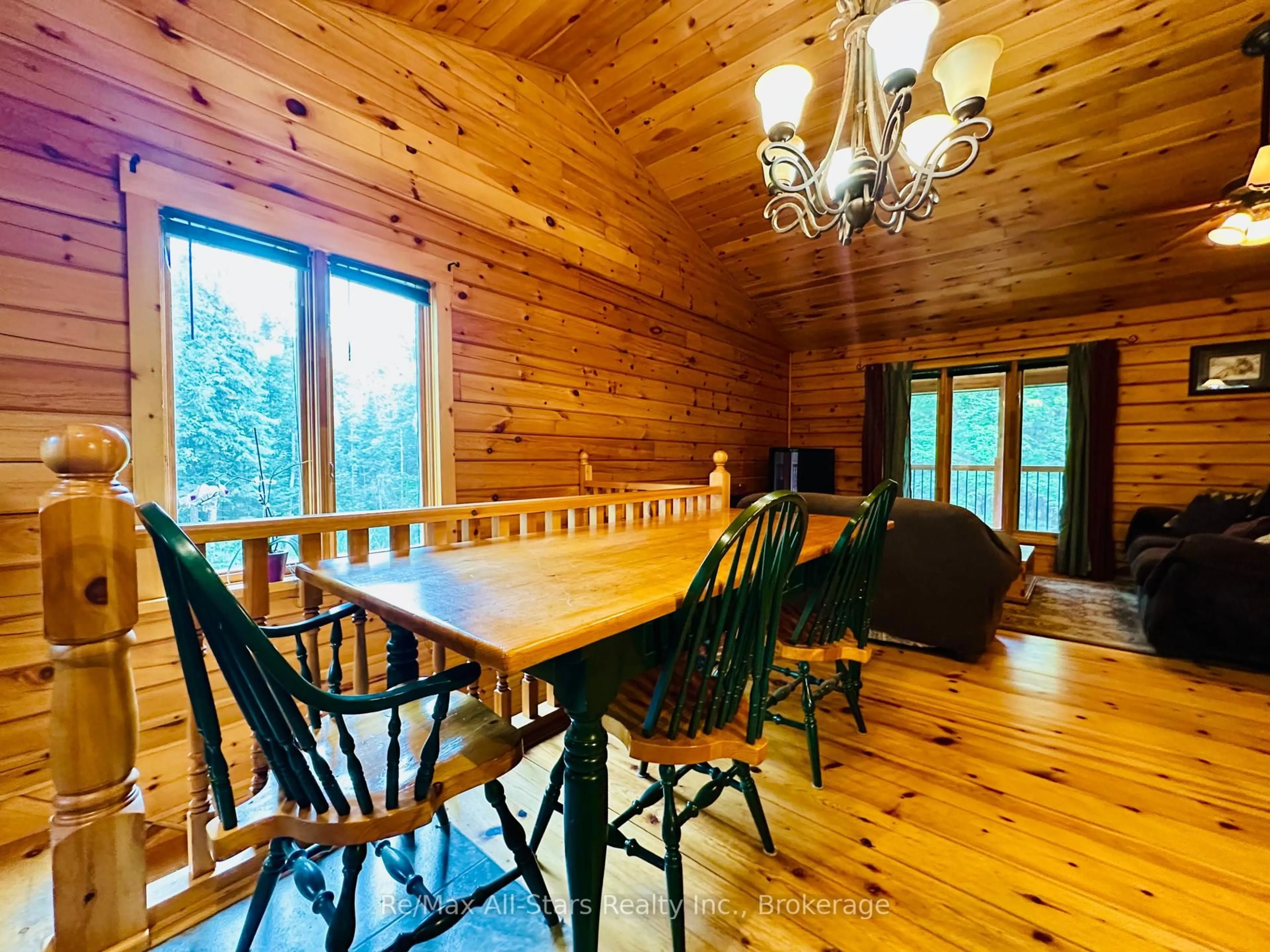 Dining room, wood/laminate floor for 7140 Highway 28, North Kawartha Ontario K0L 3E0