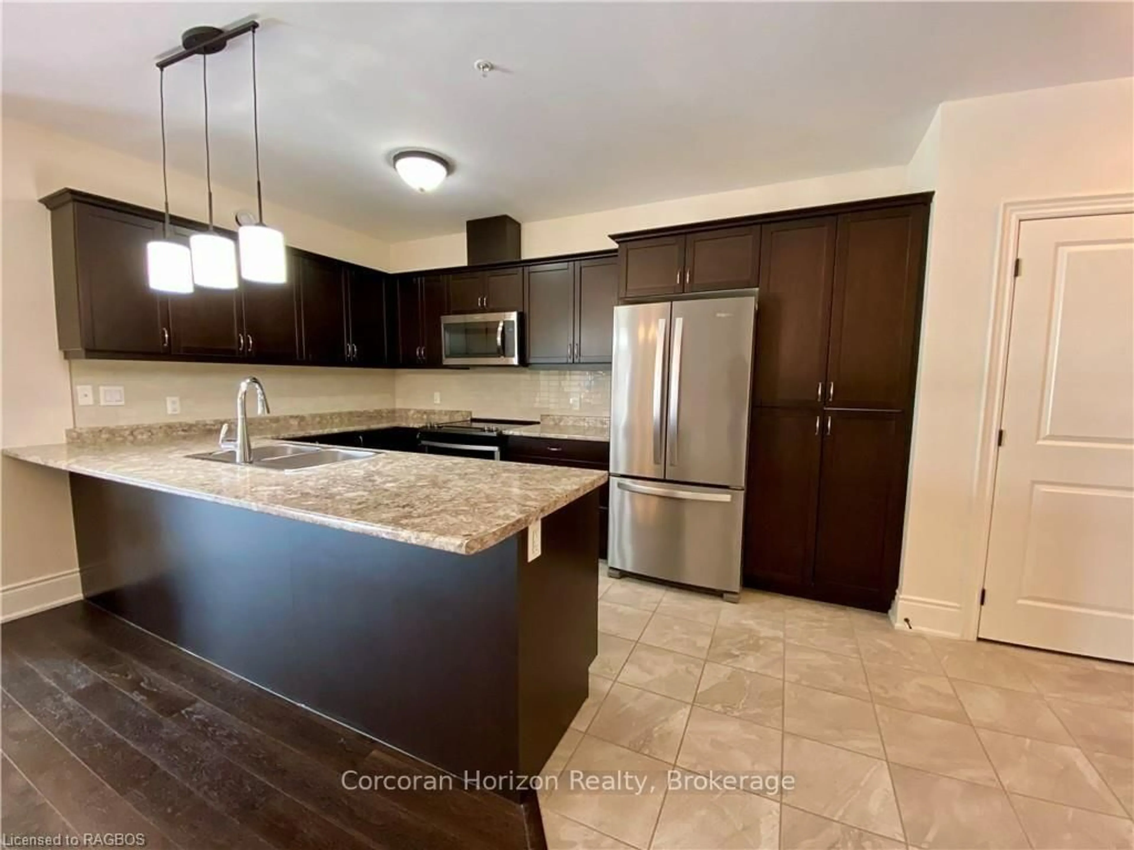 Open concept kitchen, ceramic/tile floor for 11 Salt Dock Rd #302, Parry Sound Ontario P2A 3B6