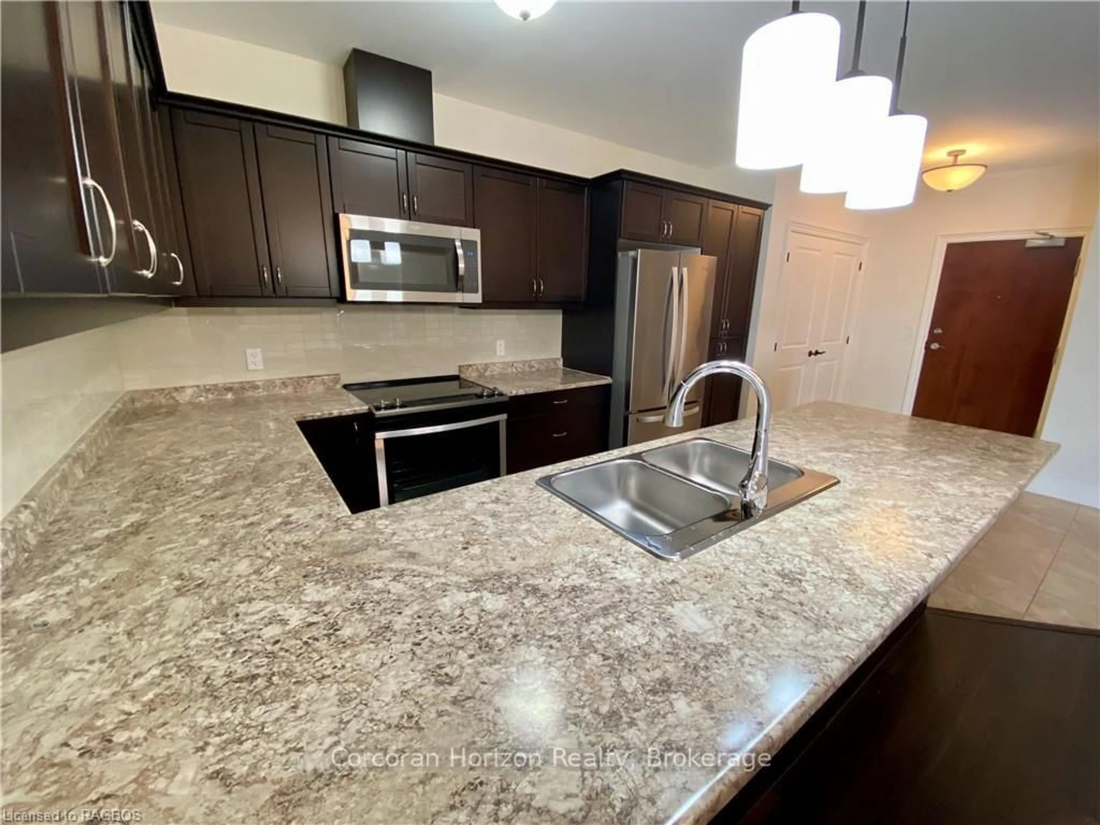 Open concept kitchen, ceramic/tile floor for 11 Salt Dock Rd #302, Parry Sound Ontario P2A 3B6