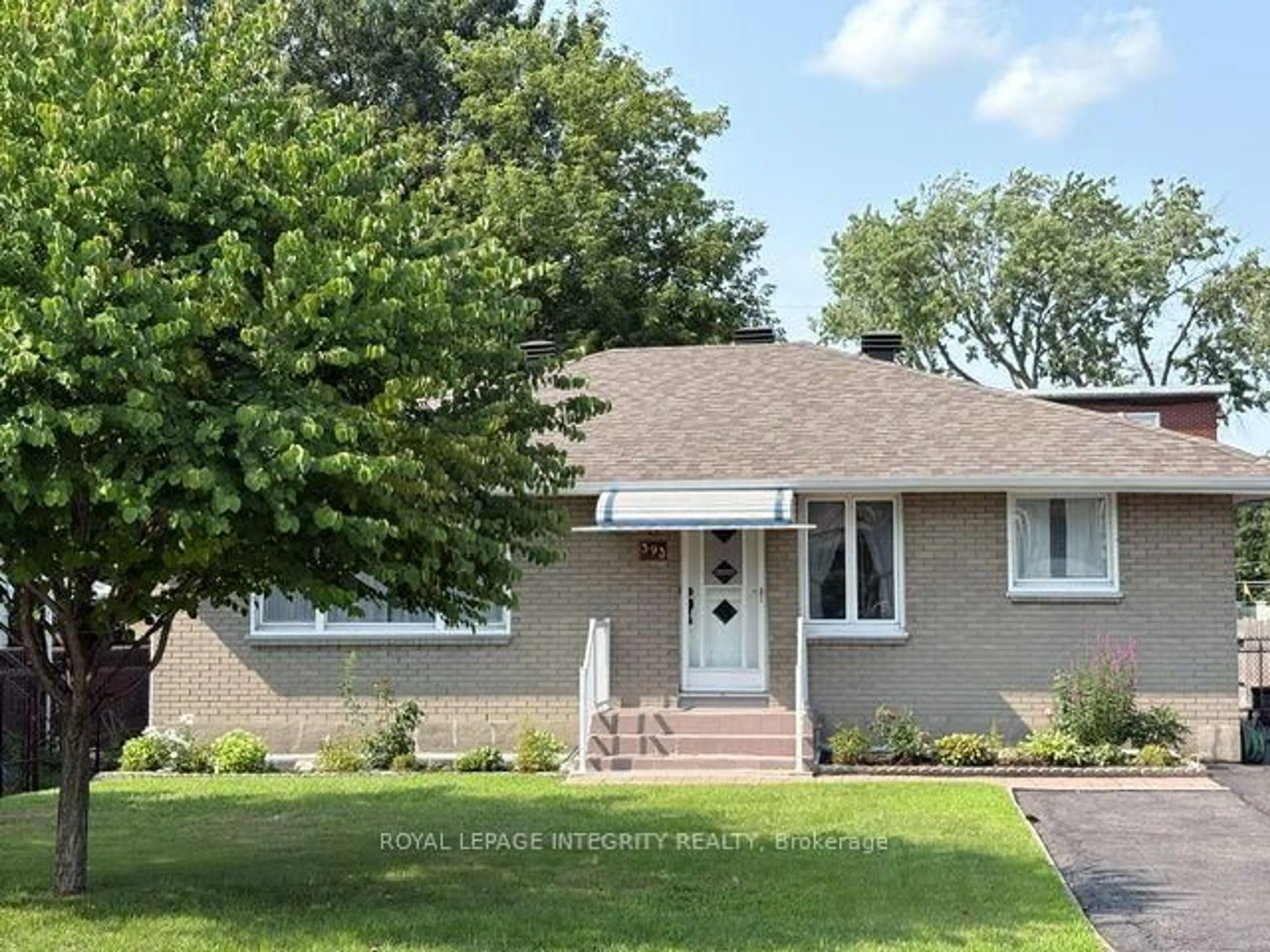 Home with brick exterior material, street for 393 Spartan Ave, Ottawa Ontario K1K 1J6