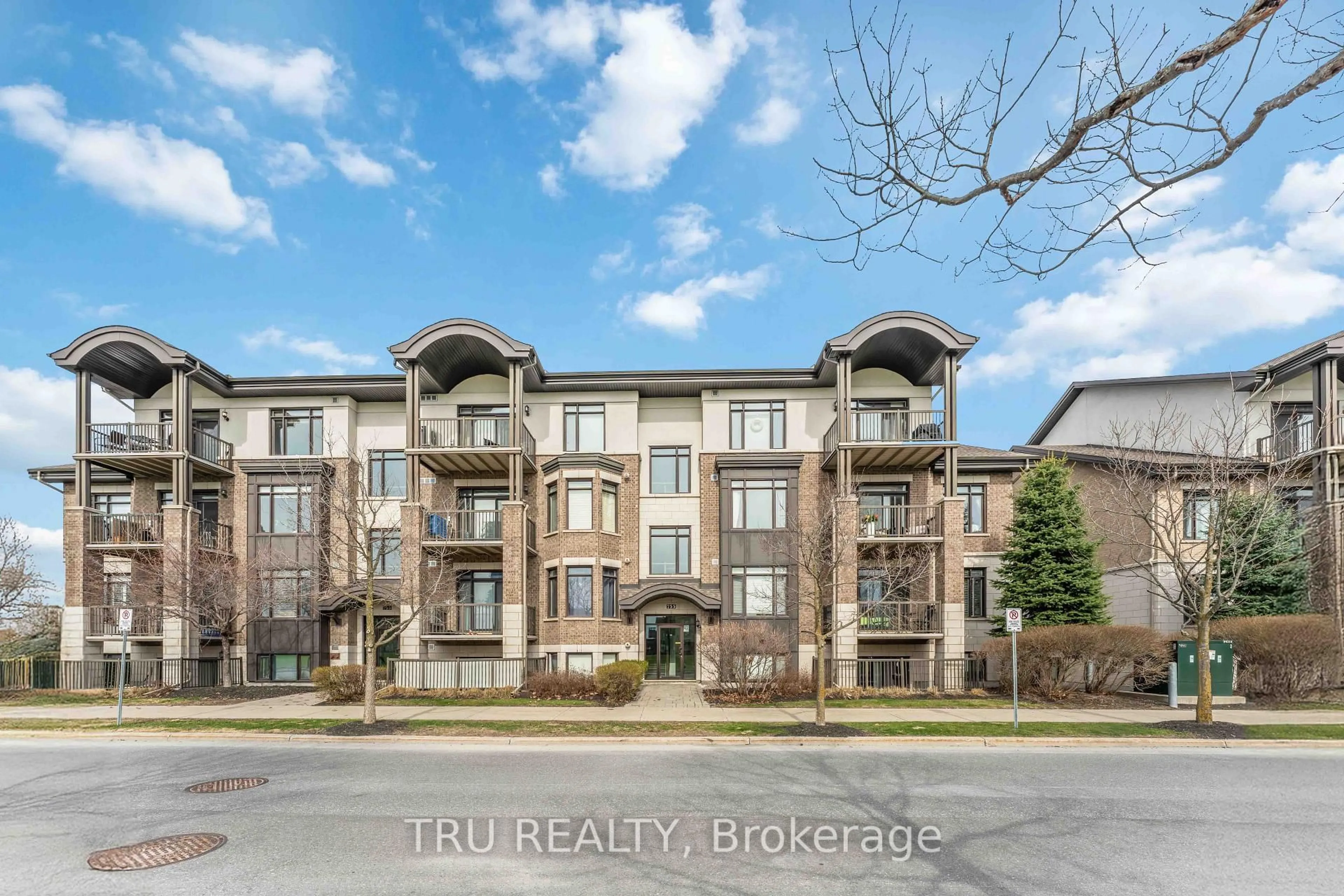 A pic from outside/outdoor area/front of a property/back of a property/a pic from drone, building for 755 Beauparc Private #301, Ottawa Ontario K1J 0B5
