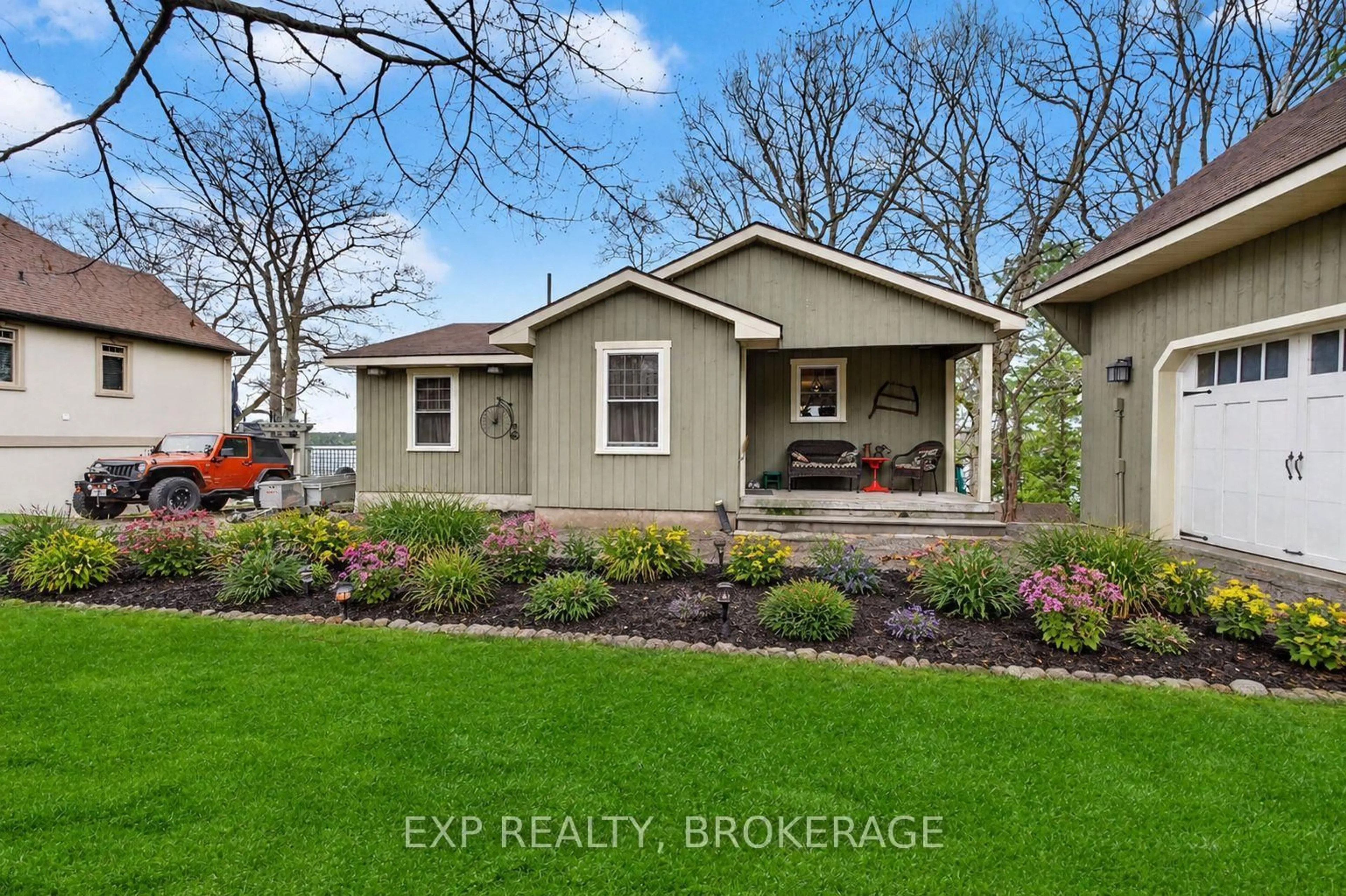 Home with vinyl exterior material, street for 59 KERRY POINT Rd, Leeds and the Thousand Islands Ontario K0E 1R0