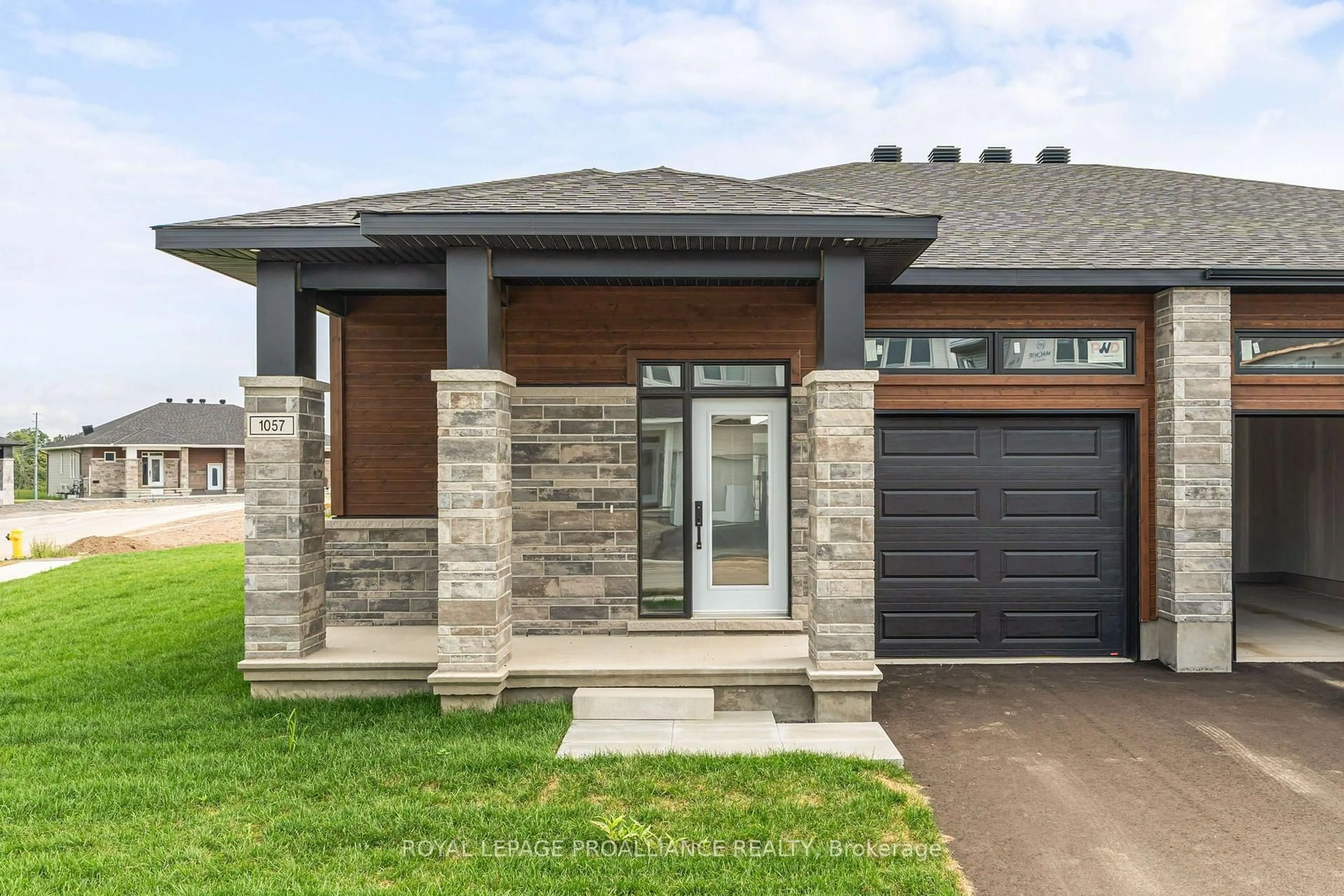 Home with brick exterior material, street for 1057 Moore St, Brockville Ontario K6V 0H1