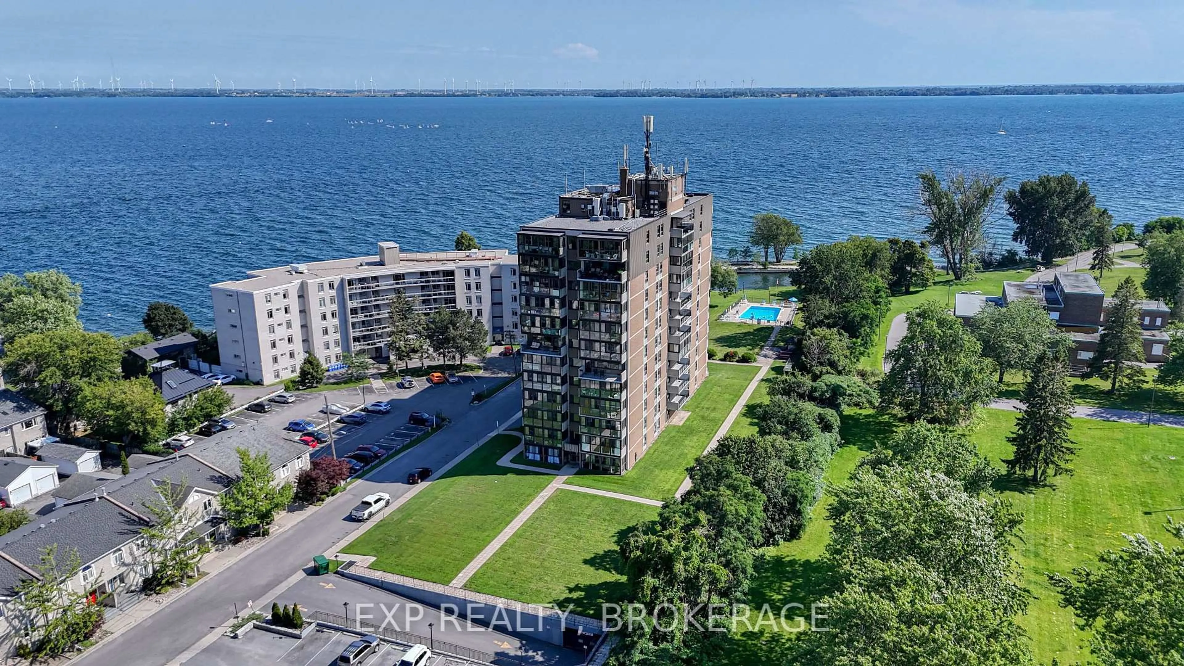 A pic from outside/outdoor area/front of a property/back of a property/a pic from drone, water/lake/river/ocean view for 2 MOWAT Ave #202, Kingston Ontario K7M 1K1