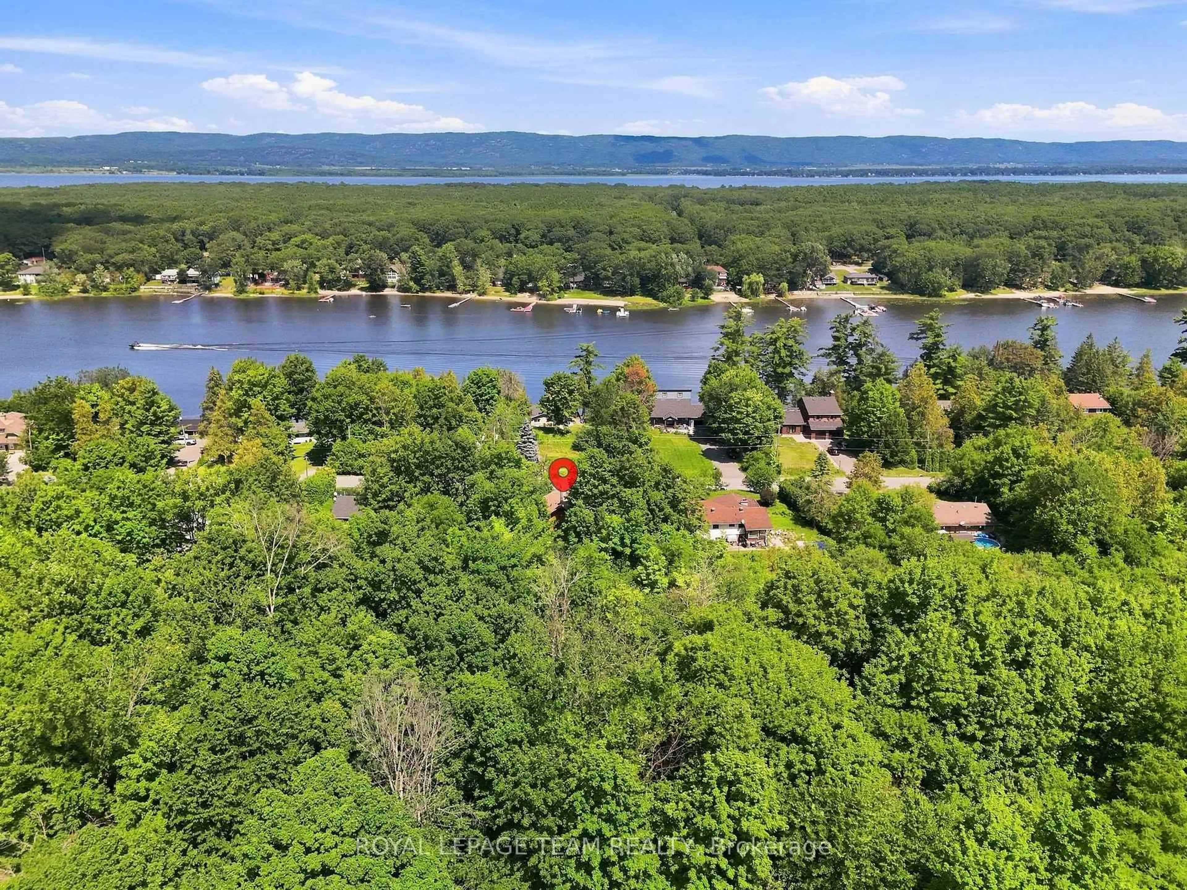 A pic from outside/outdoor area/front of a property/back of a property/a pic from drone, water/lake/river/ocean view for 4467 Tranquility Lane, Ottawa Ontario K0A 3M0