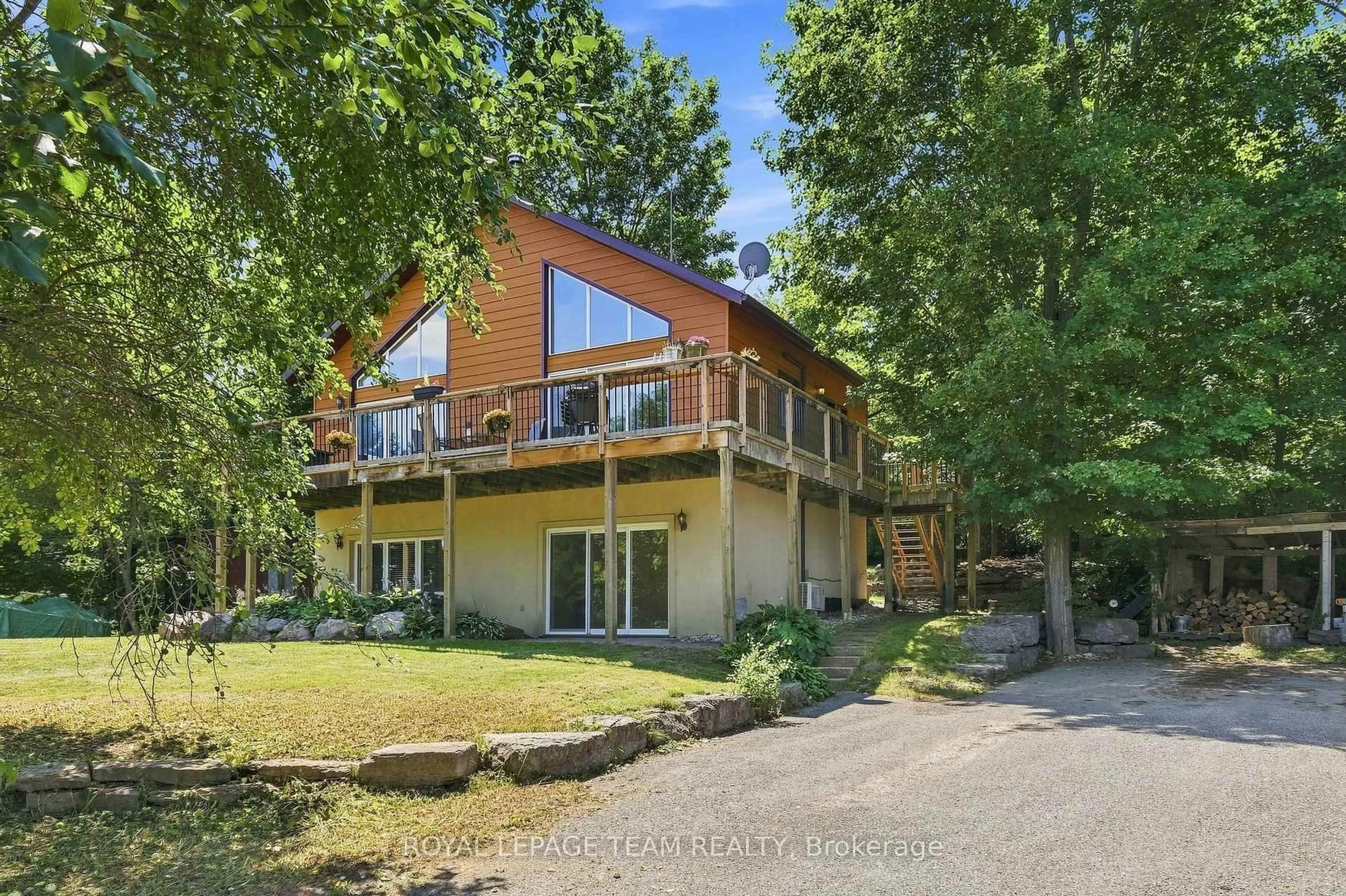 A pic from outside/outdoor area/front of a property/back of a property/a pic from drone, water/lake/river/ocean view for 4467 Tranquility Lane, Ottawa Ontario K0A 3M0