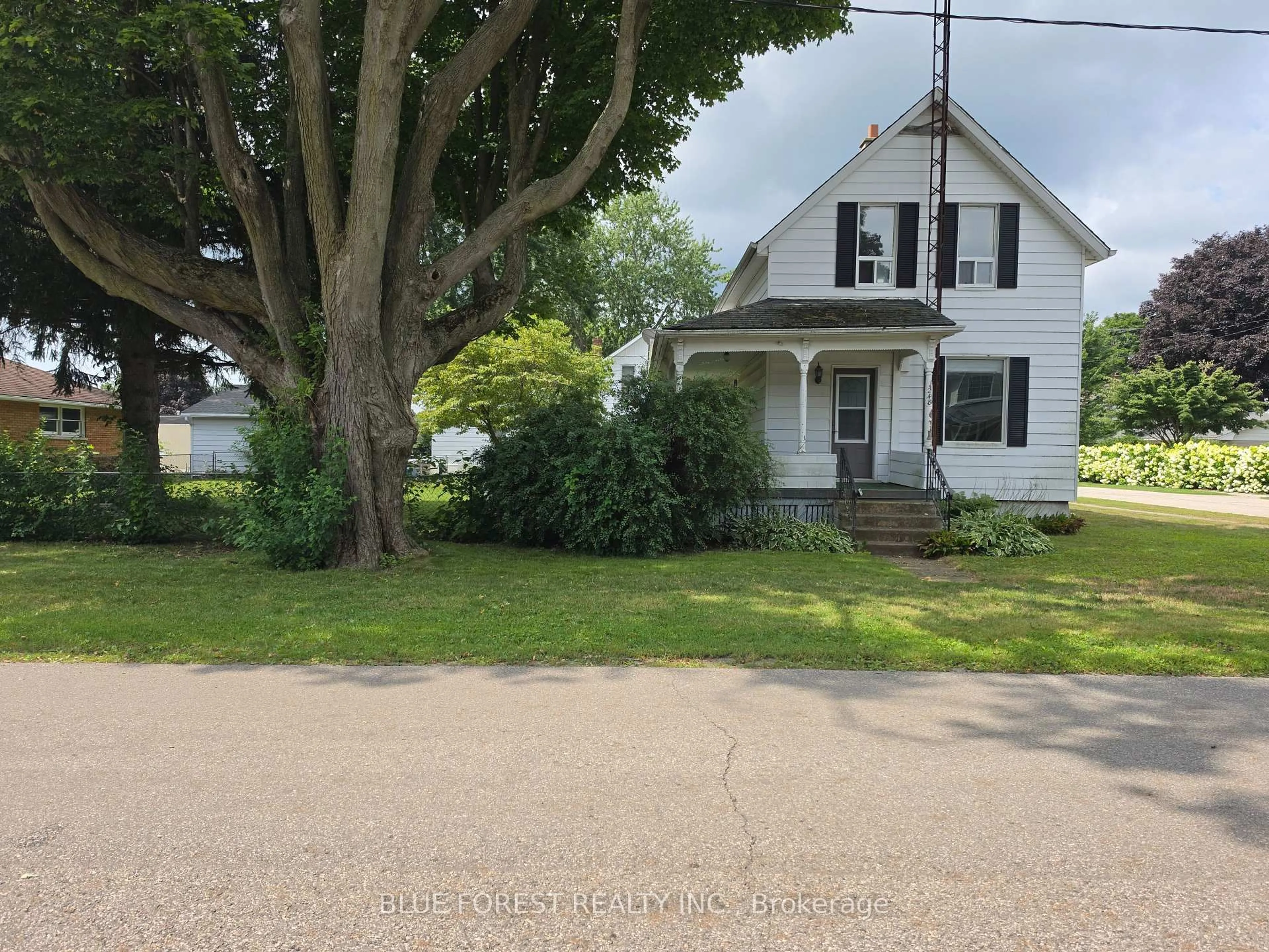 A pic from outside/outdoor area/front of a property/back of a property/a pic from drone, street for 248 Ridout St, West Elgin Ontario N0L 2C0