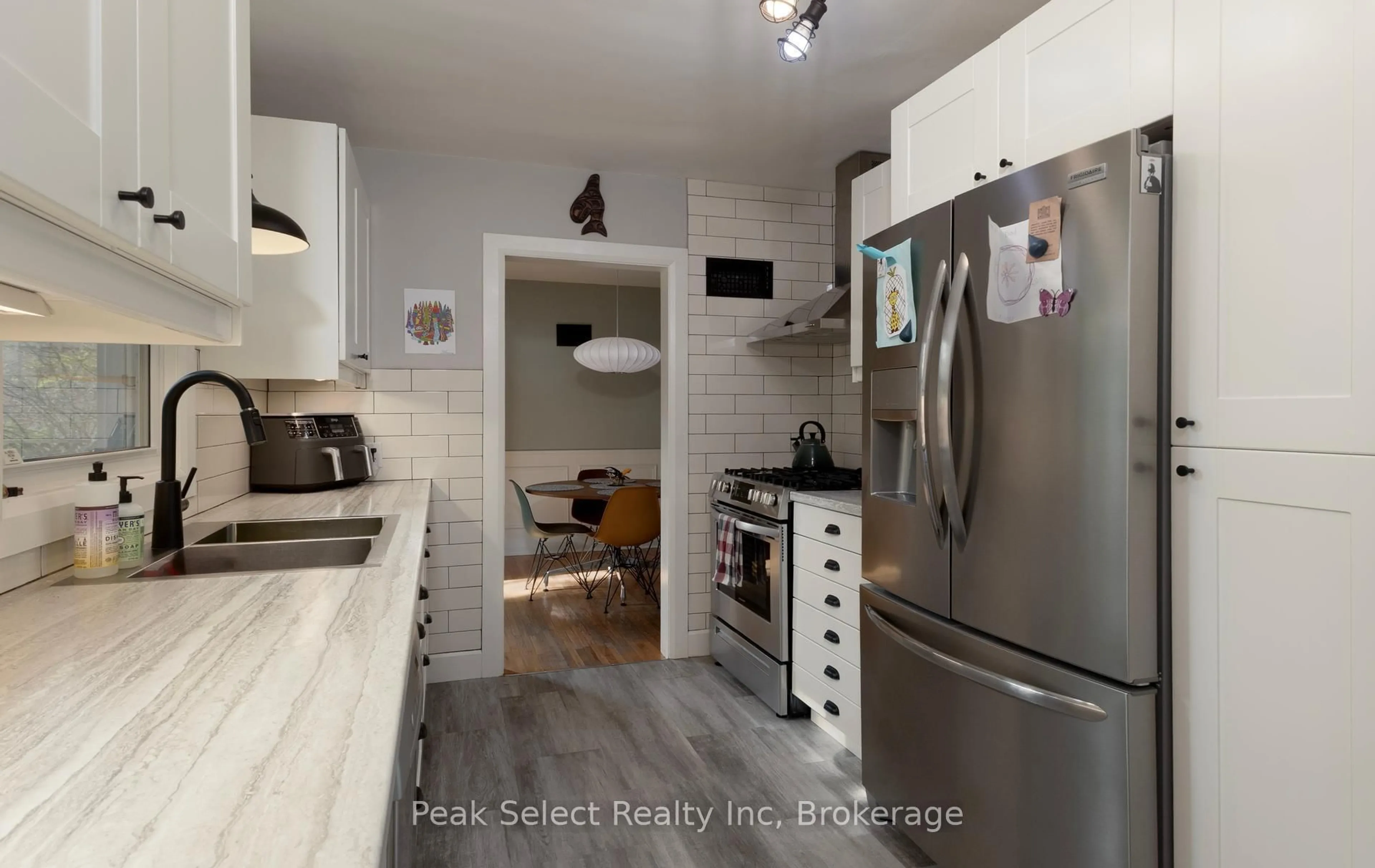Open concept kitchen, wood/laminate floor for 349 Edward St, South Huron Ontario N0M 1S7