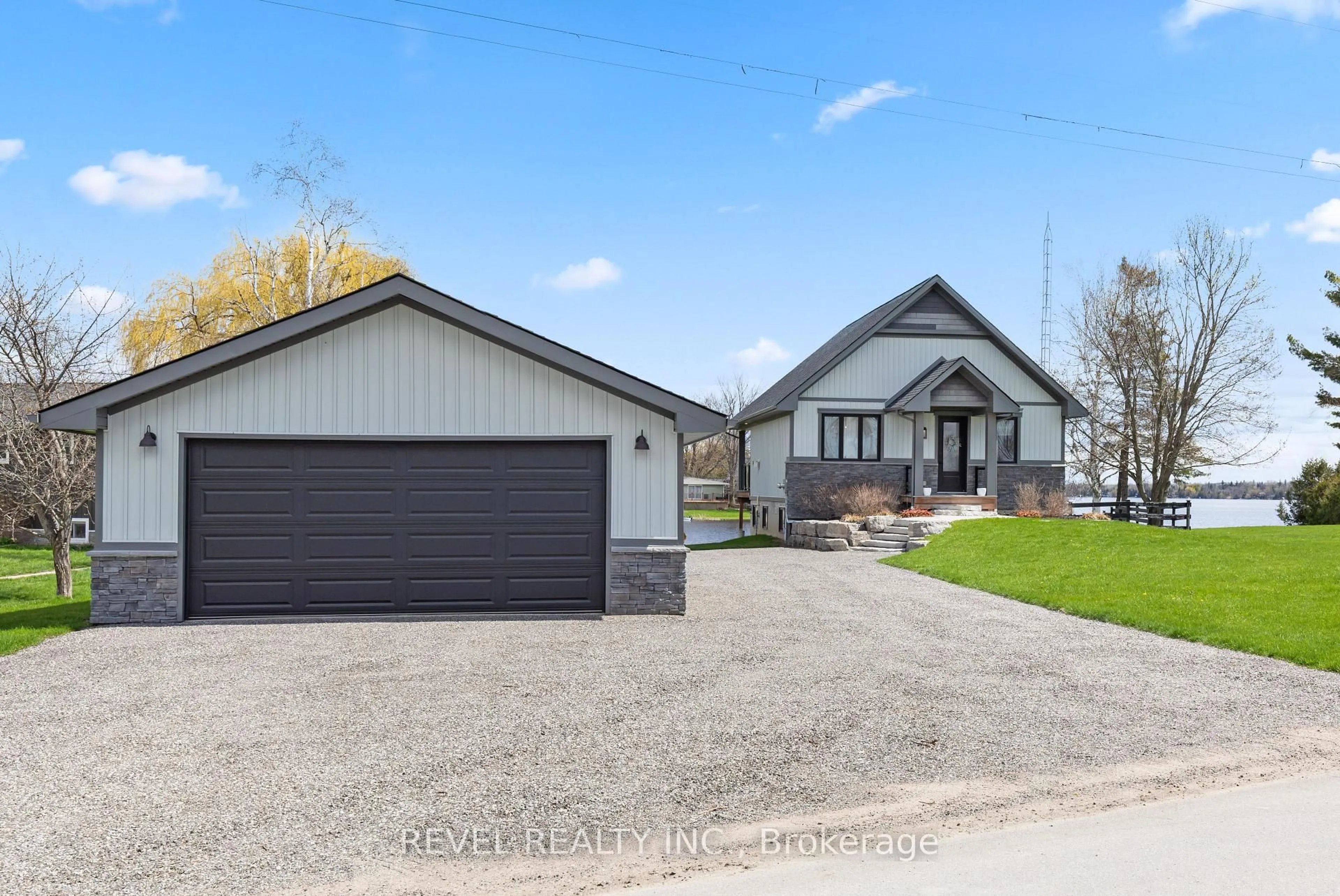 Home with vinyl exterior material, street for 15 Glassford Rd, Kawartha Lakes Ontario K0M 2C0