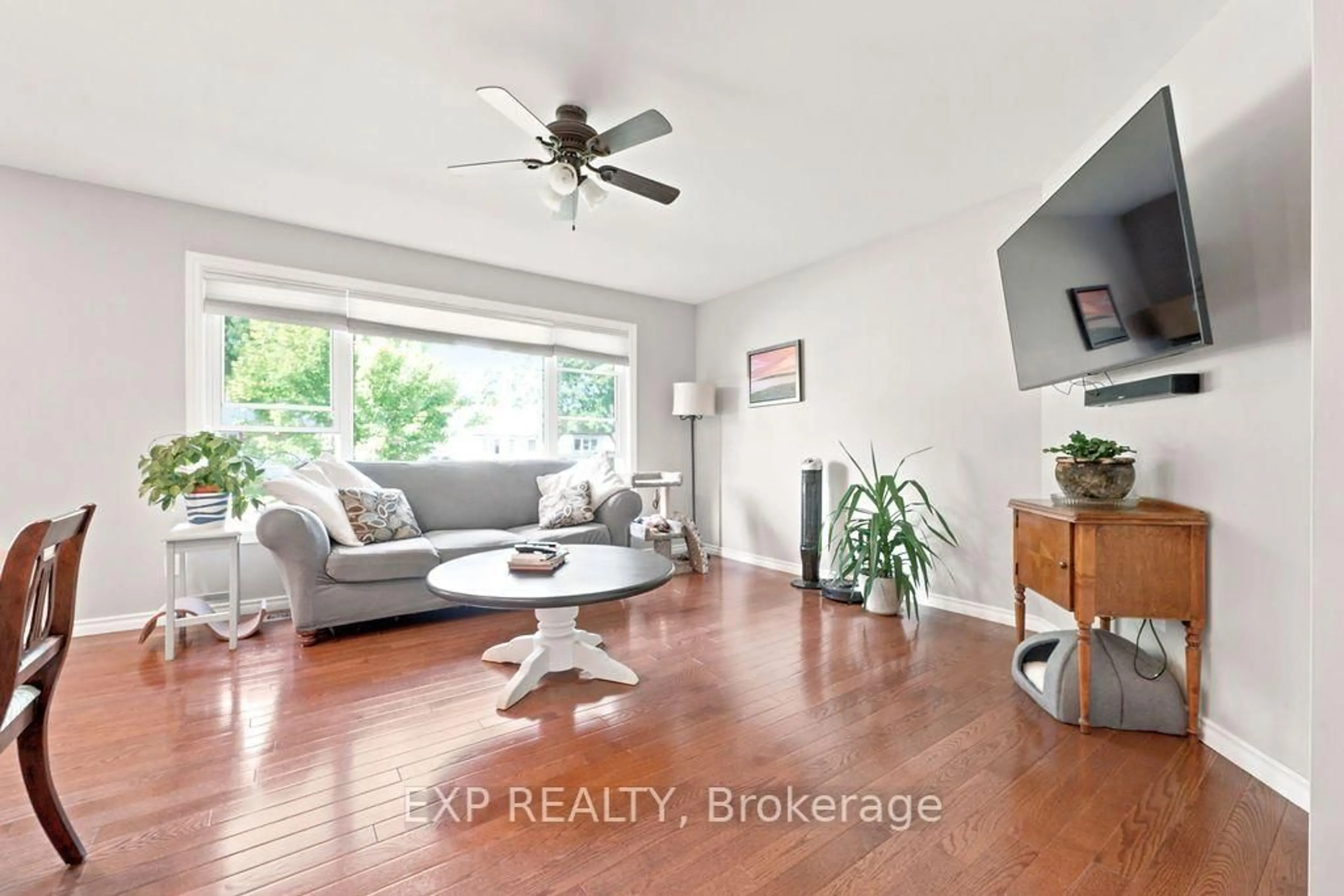 Living room with furniture, wood/laminate floor for 493 Fortington St, Renfrew Ontario K7V 1E3