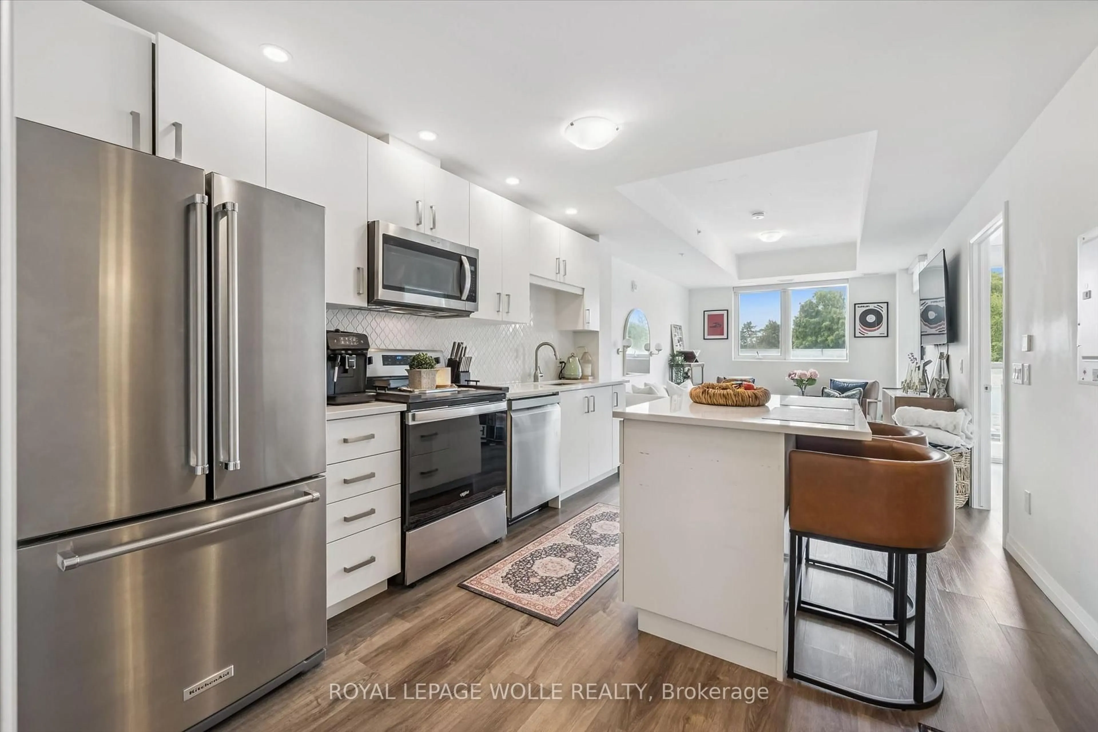 Open concept kitchen, ceramic/tile floor for 108 Garment St #213, Kitchener Ontario N2G 0E2