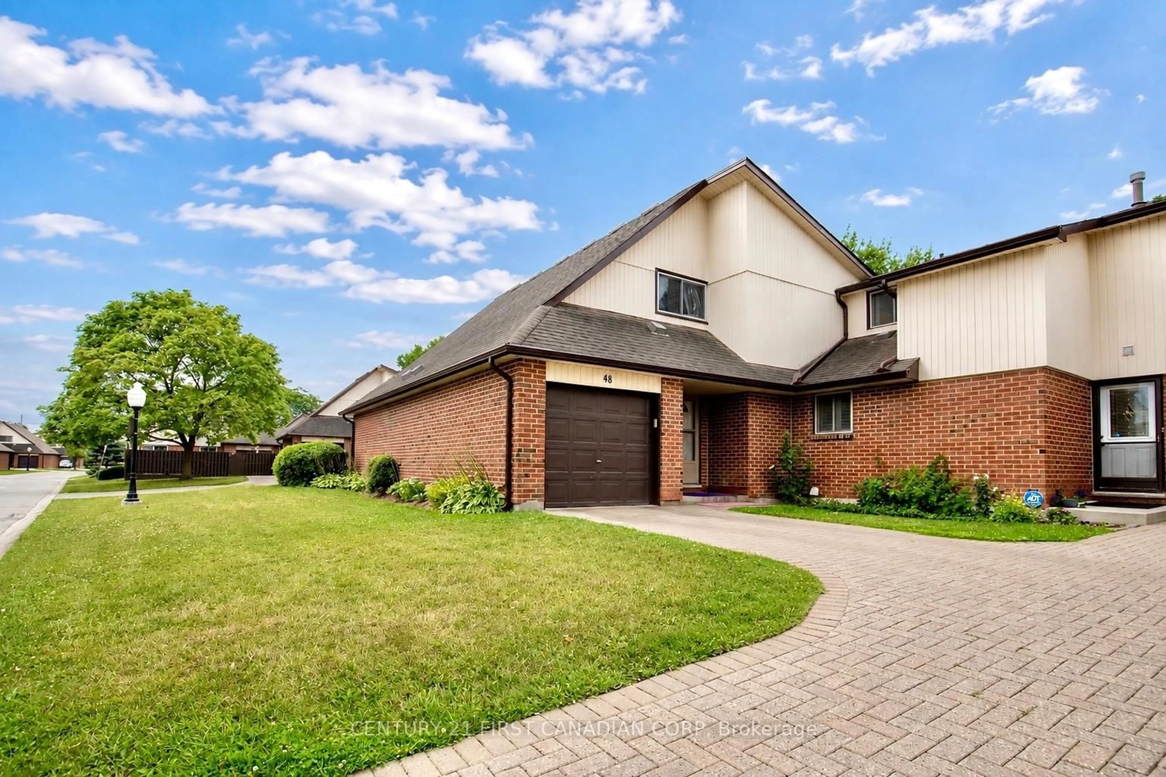 Home with brick exterior material, street for 971 Adelaide St #48, London South Ontario N6E 2H3