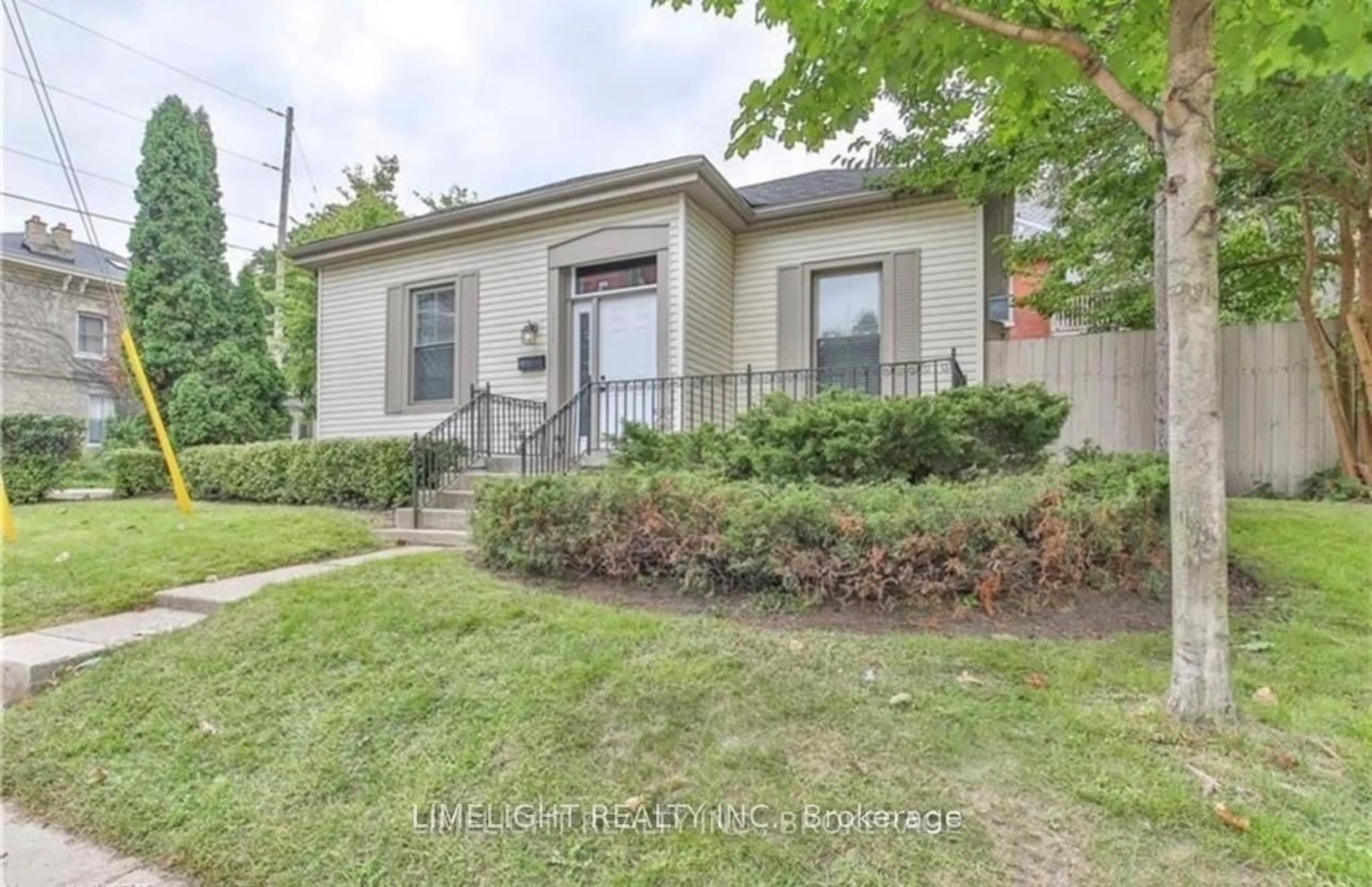Home with brick exterior material, street for 615 Talbot St, London East Ontario N6A 2T4