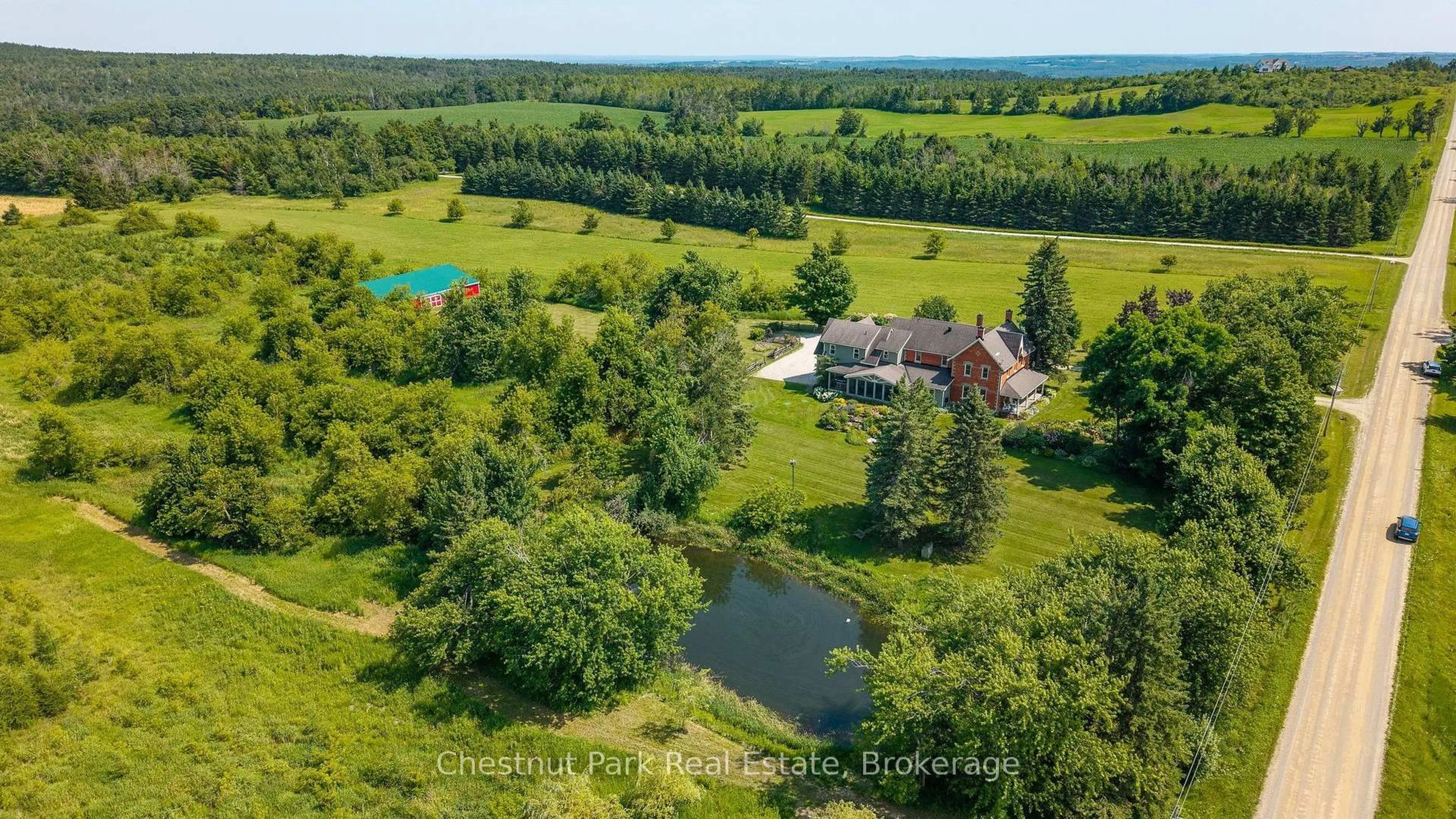 A pic from outside/outdoor area/front of a property/back of a property/a pic from drone, water/lake/river/ocean view for 678541 Centre Rd, Mulmur Ontario L9V 0C7