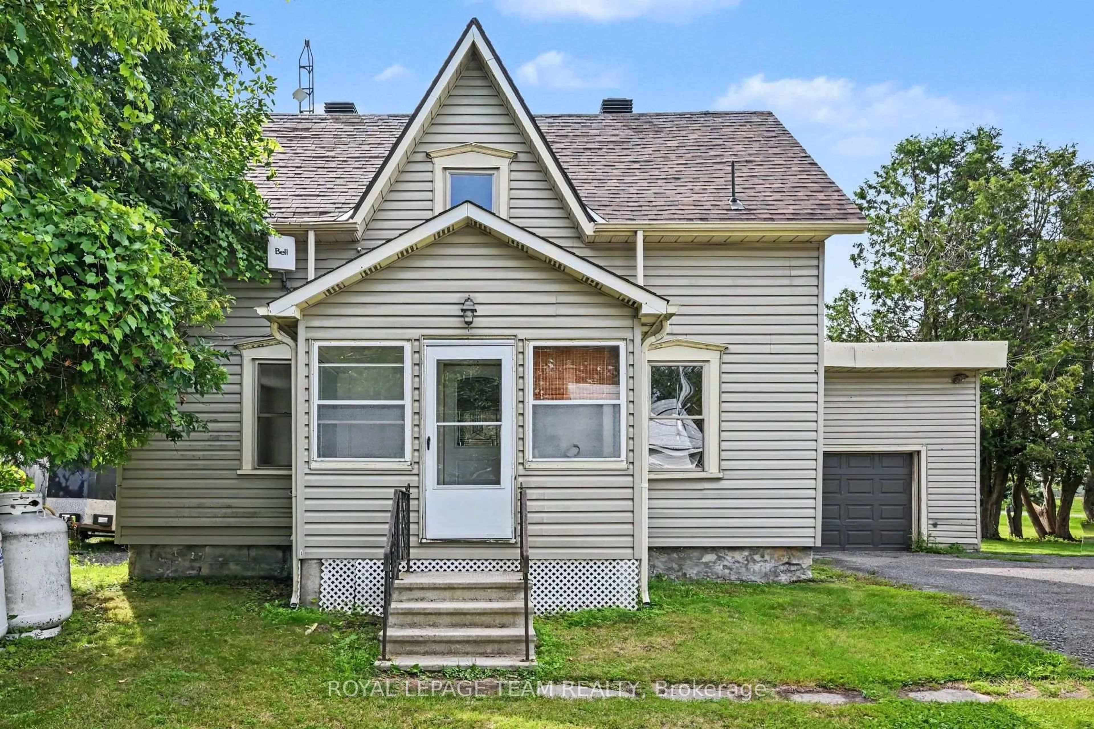Home with vinyl exterior material, street for 10526 Van Allen Rd, North Dundas Ontario K0E 1S0