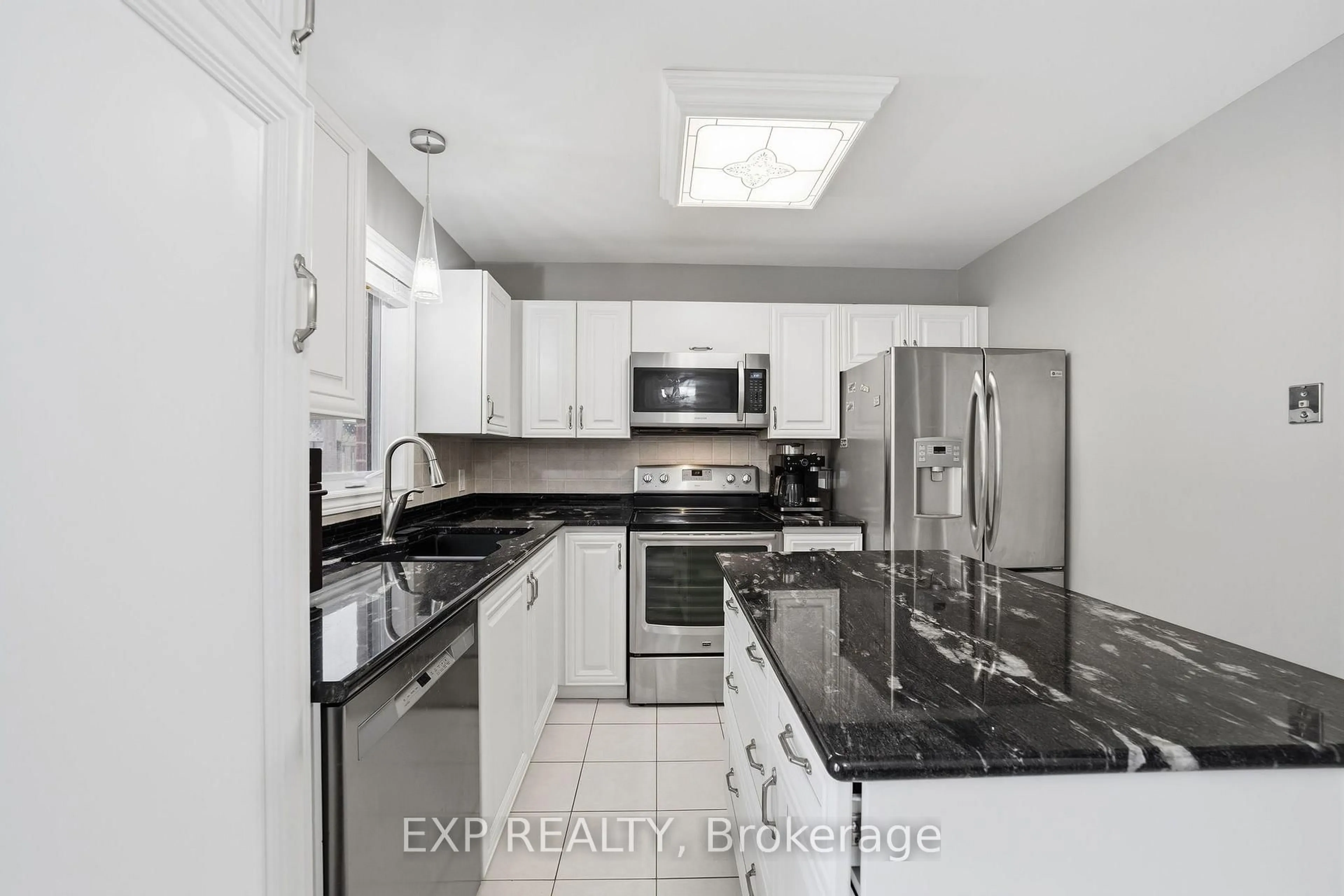 Standard kitchen, ceramic/tile floor for 511 Admiral Dr #49, London East Ontario N5V 4R4