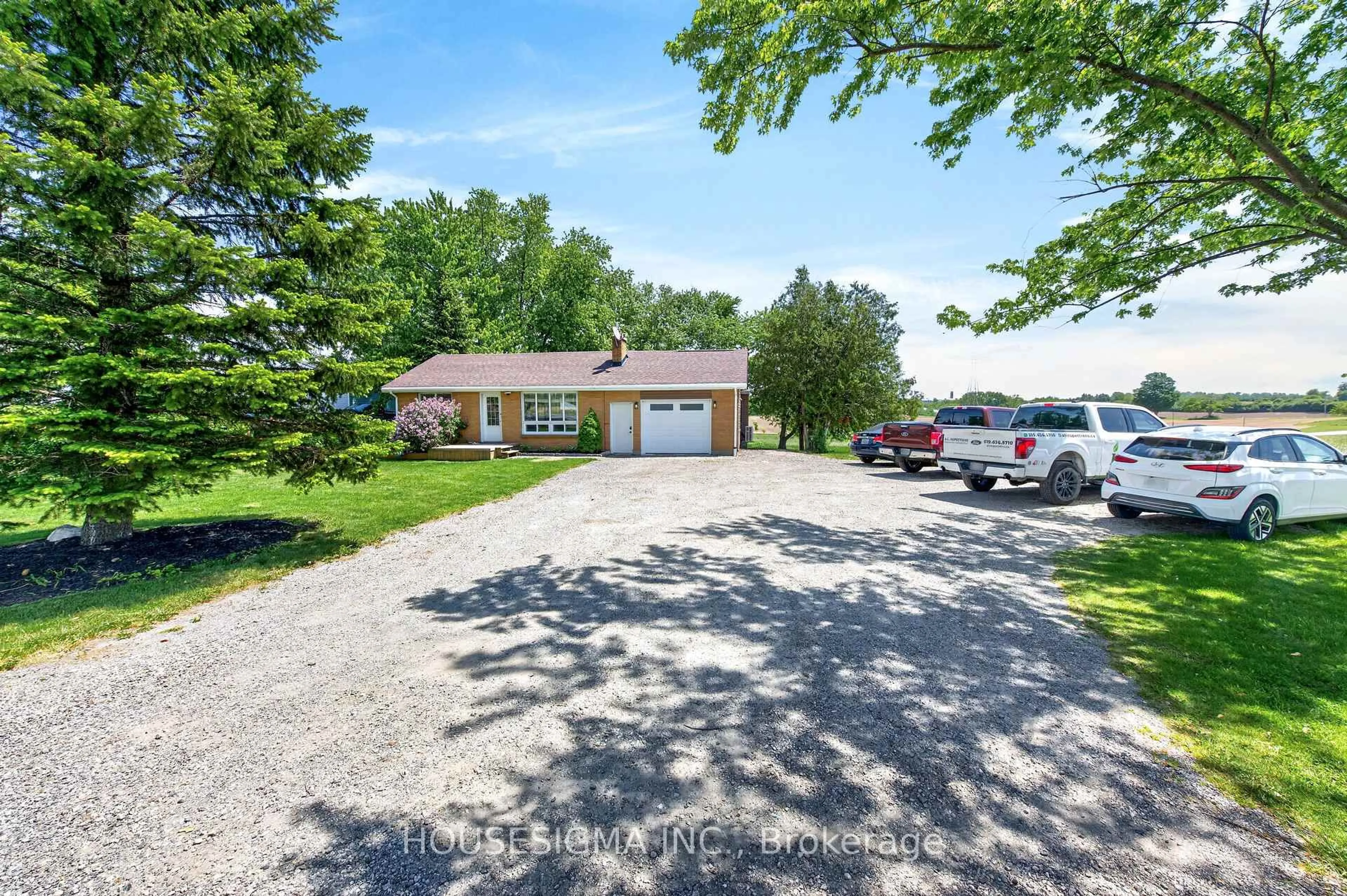 A pic from outside/outdoor area/front of a property/back of a property/a pic from drone, street for 3402 Dorchester Rd, Thames Centre Ontario N0L 1G5