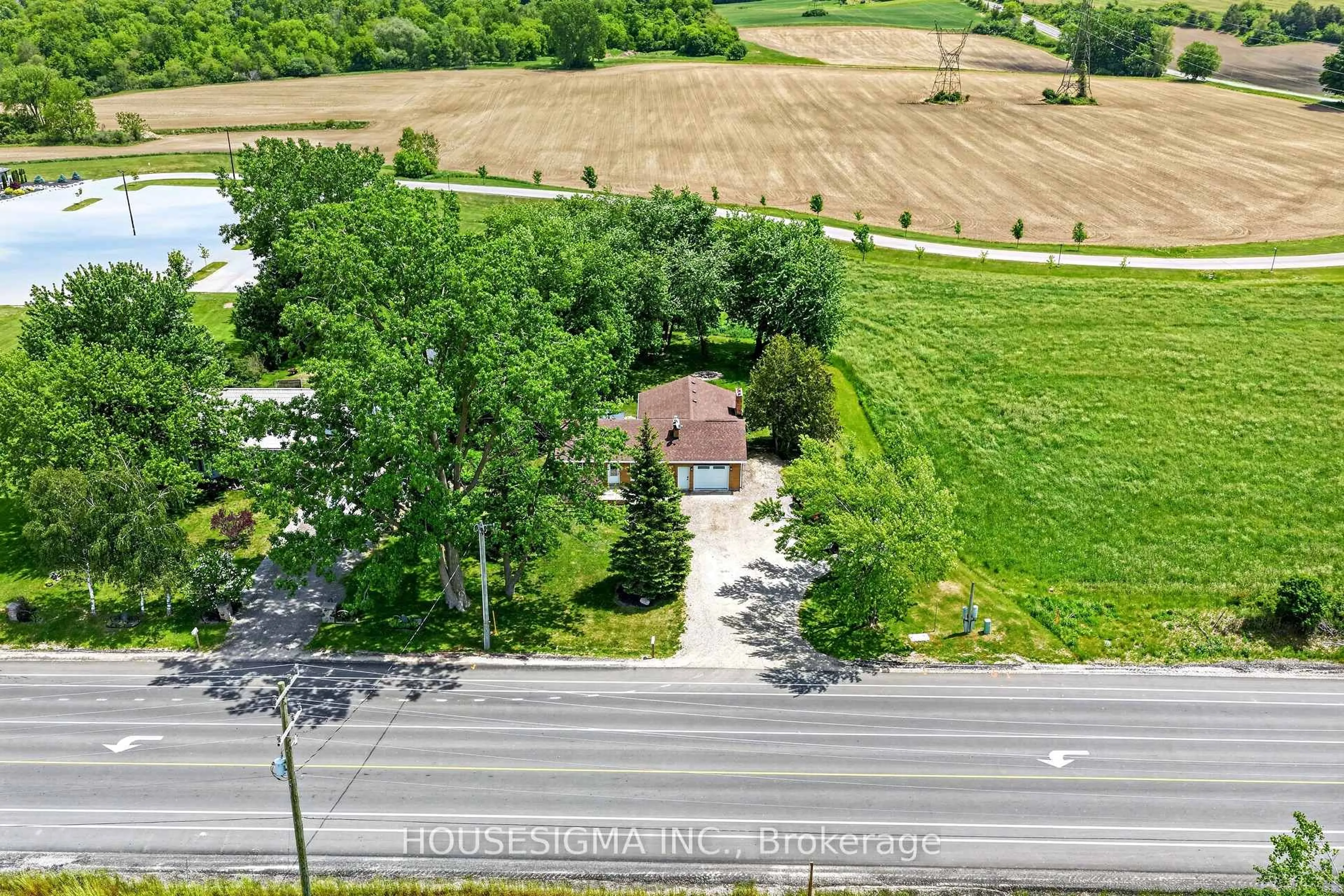 A pic from outside/outdoor area/front of a property/back of a property/a pic from drone, street for 3402 Dorchester Rd, Thames Centre Ontario N0L 1G5