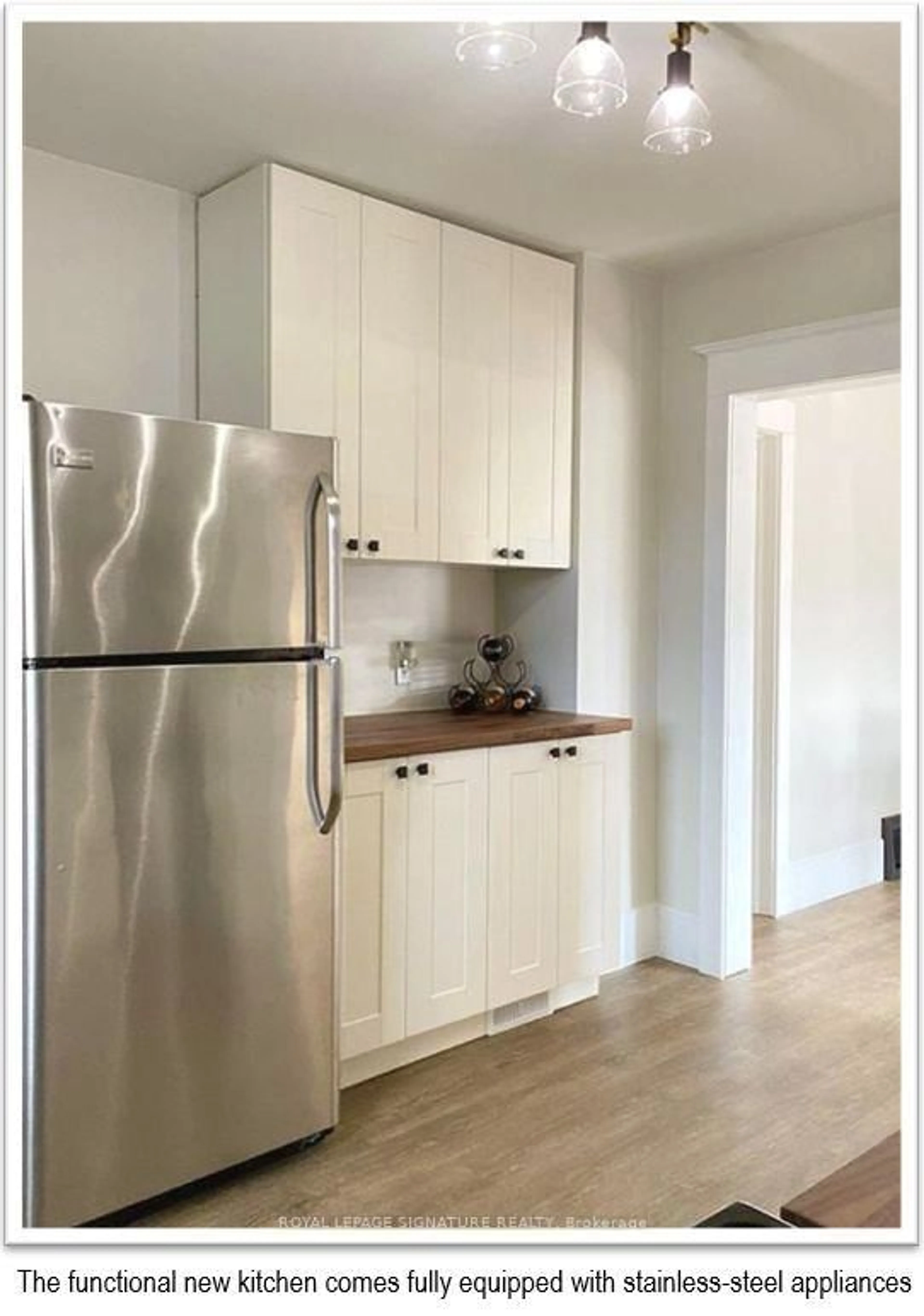 Standard kitchen, wood/laminate floor for 13 Delaware St, St. Catharines Ontario L5M 5L9