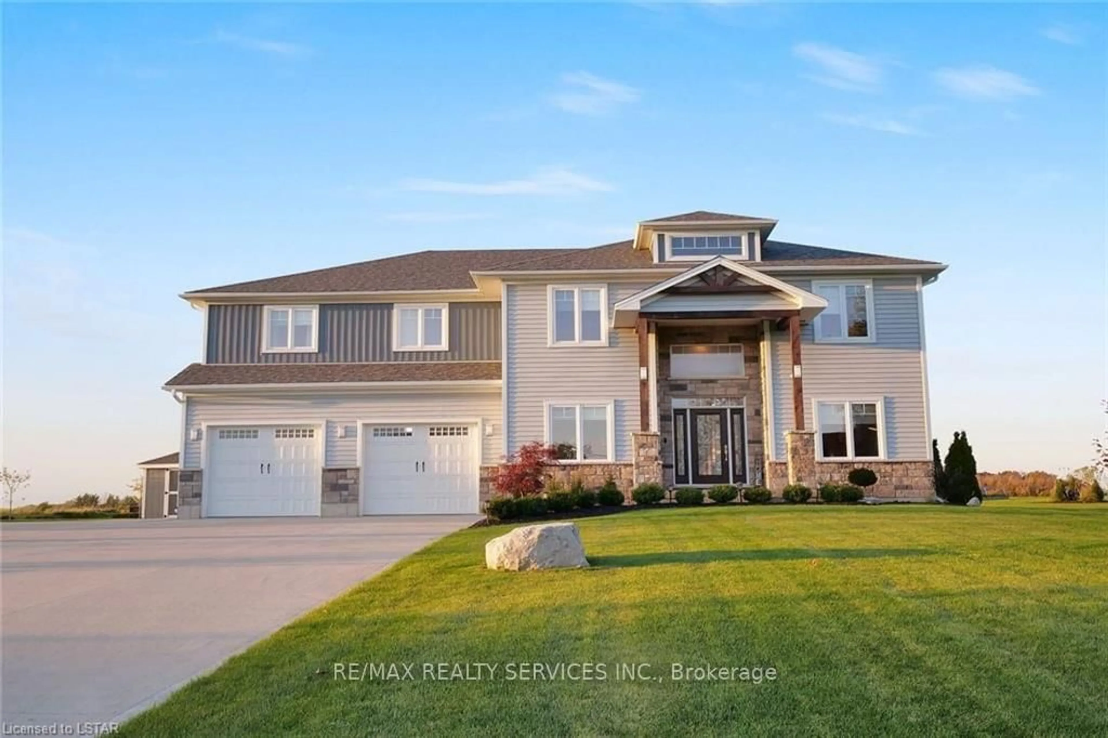 Home with vinyl exterior material, street for 51048 Ron Mcneil Line, Malahide Ontario N0L 2J0