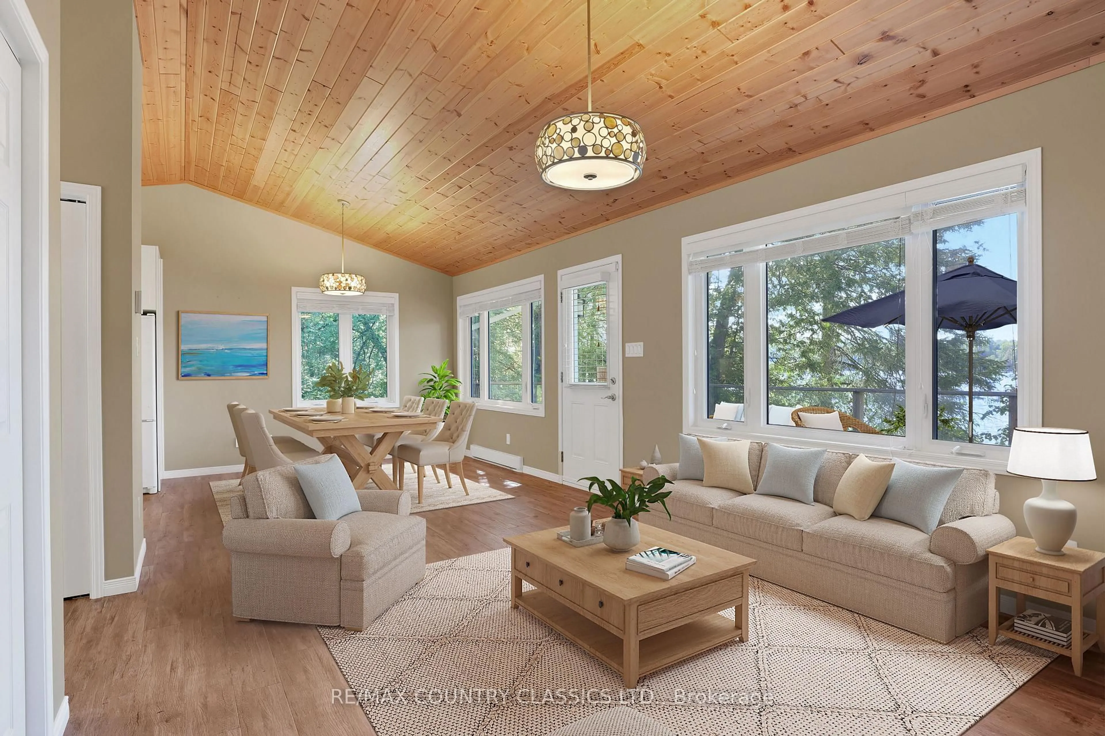 Living room with furniture, wood/laminate floor for 27241 Highway 28, Highlands East Ontario K0L 1M0