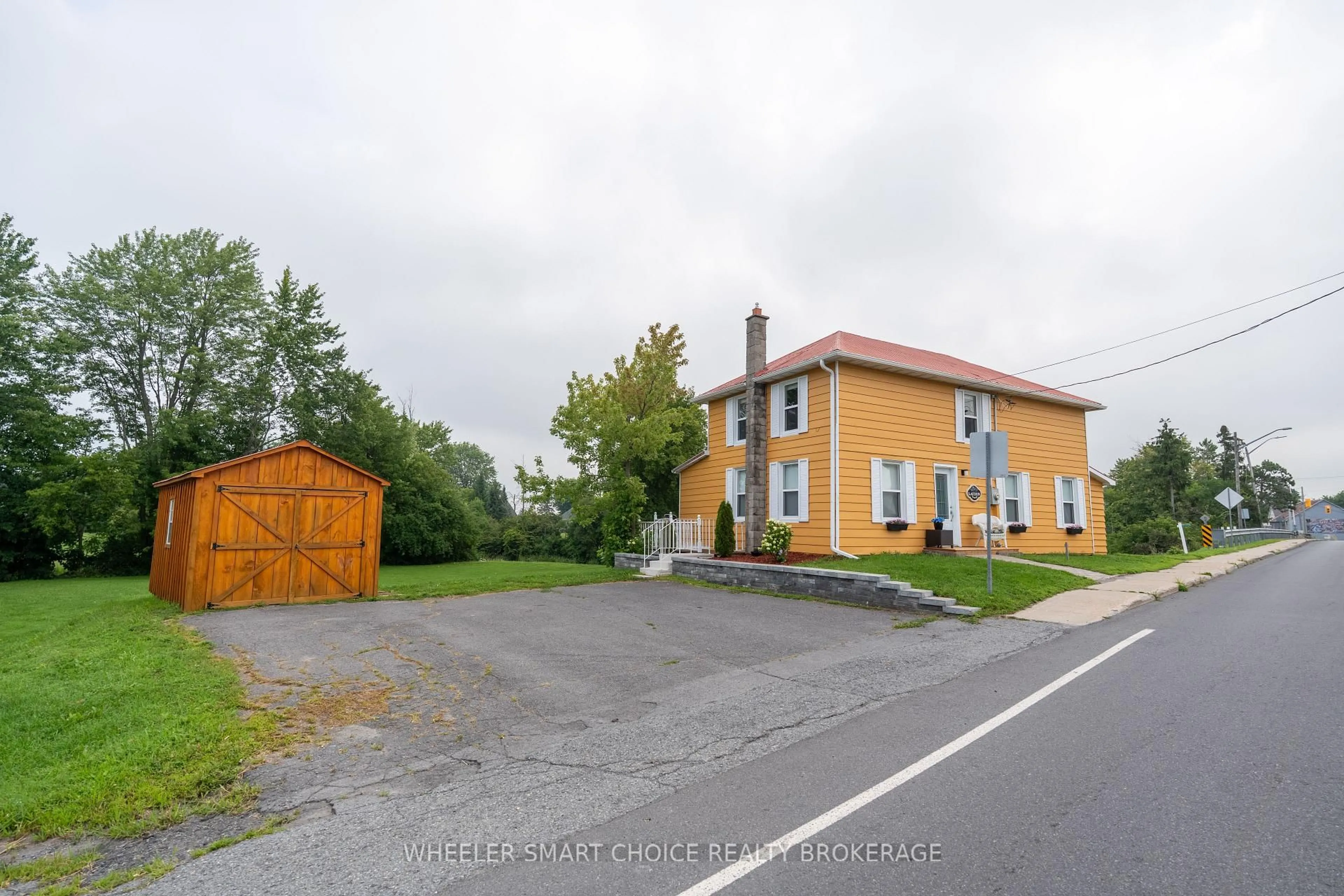A pic from outside/outdoor area/front of a property/back of a property/a pic from drone, street for 17295 County Rd 18 Rd, South Stormont Ontario K0C 2A0