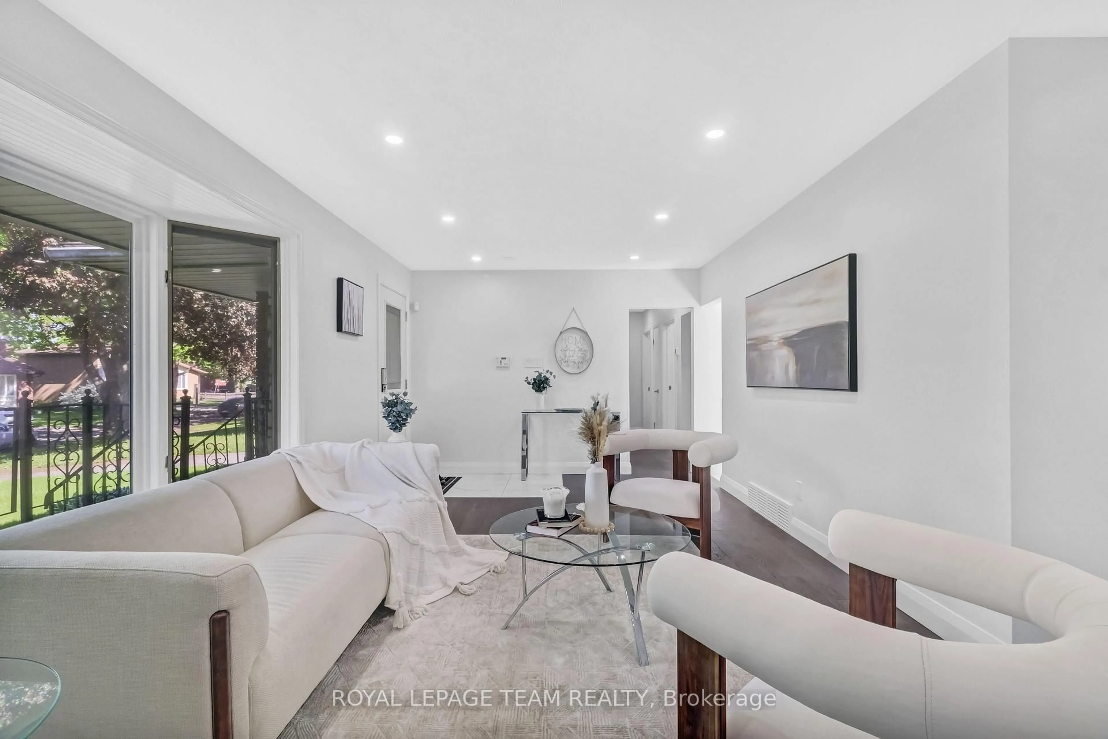 Living room with furniture, unknown for 2317 Elmira Dr, Ottawa Ontario K2C 1H3