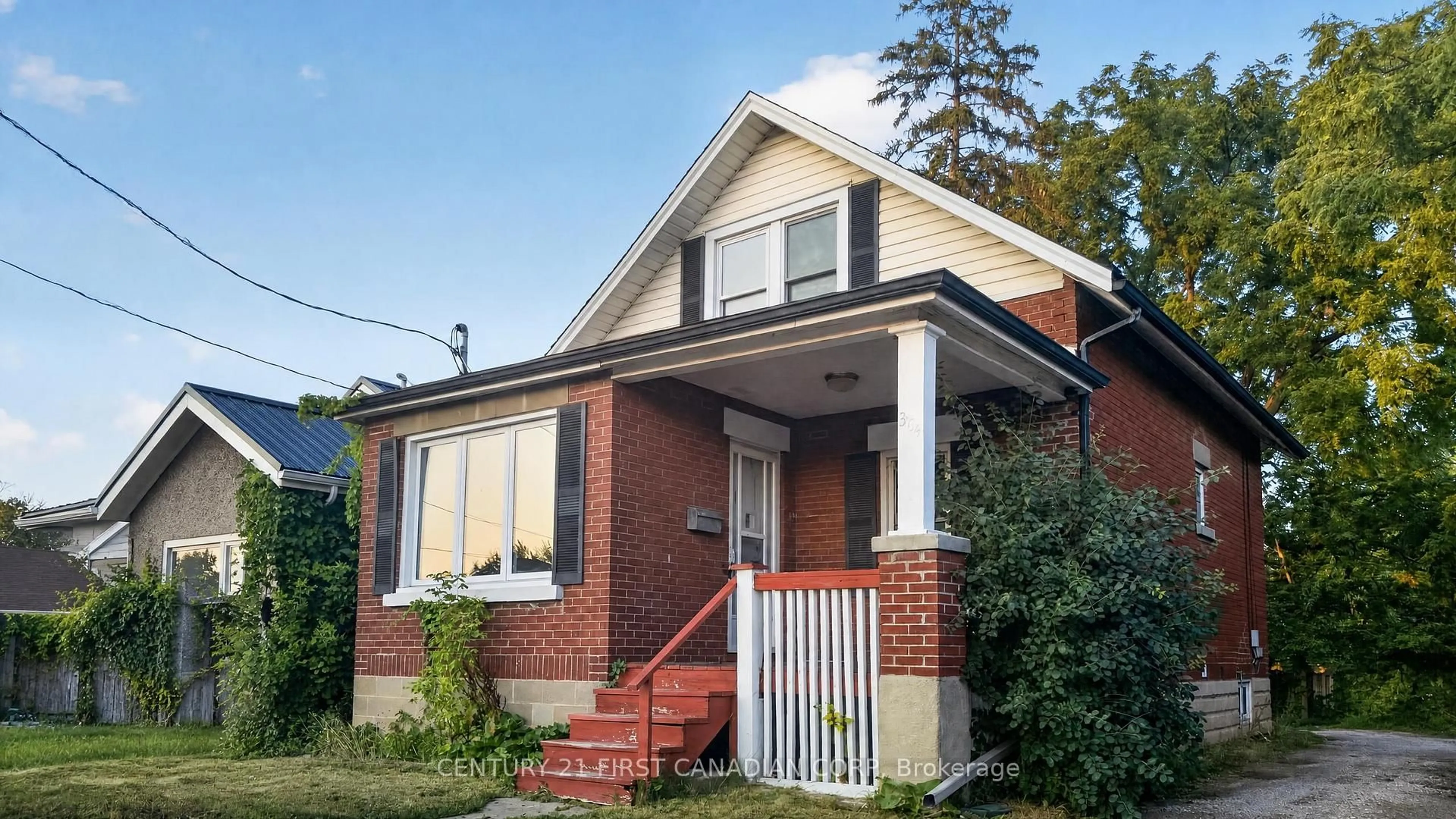 Home with brick exterior material, street for 384 Wharncliffe Rd, London South Ontario N6J 2M1