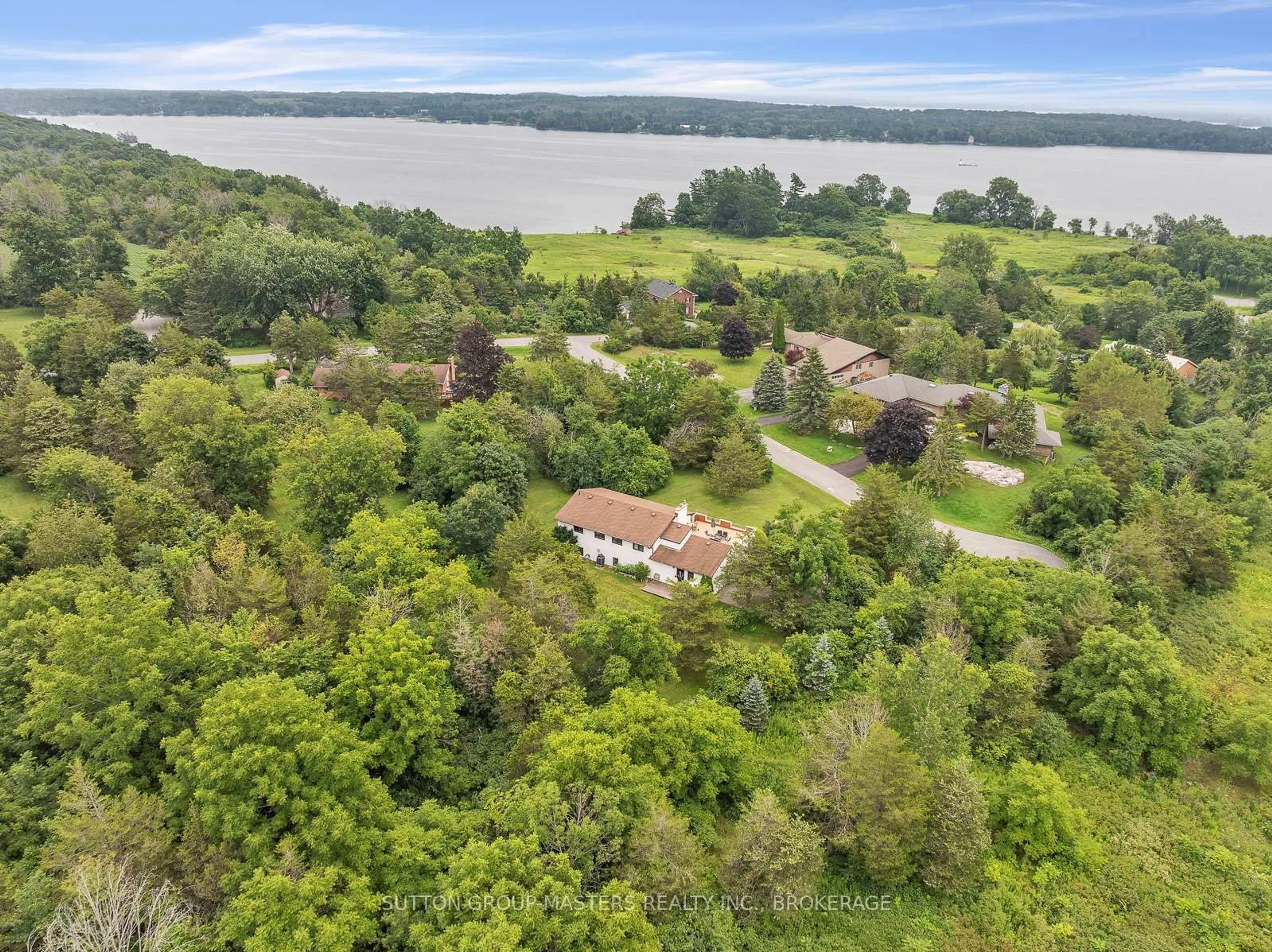 A pic from outside/outdoor area/front of a property/back of a property/a pic from drone, water/lake/river/ocean view for 2 Stonehead Circ, Kingston Ontario K7L 4V1