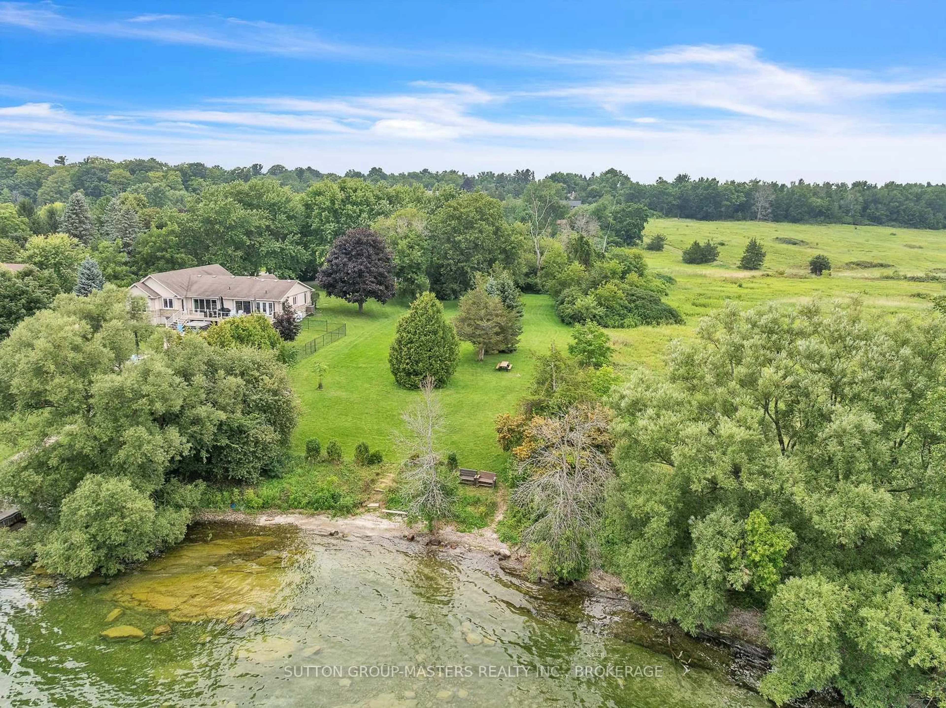 A pic from outside/outdoor area/front of a property/back of a property/a pic from drone, water/lake/river/ocean view for 2 Stonehead Circ, Kingston Ontario K7L 4V1