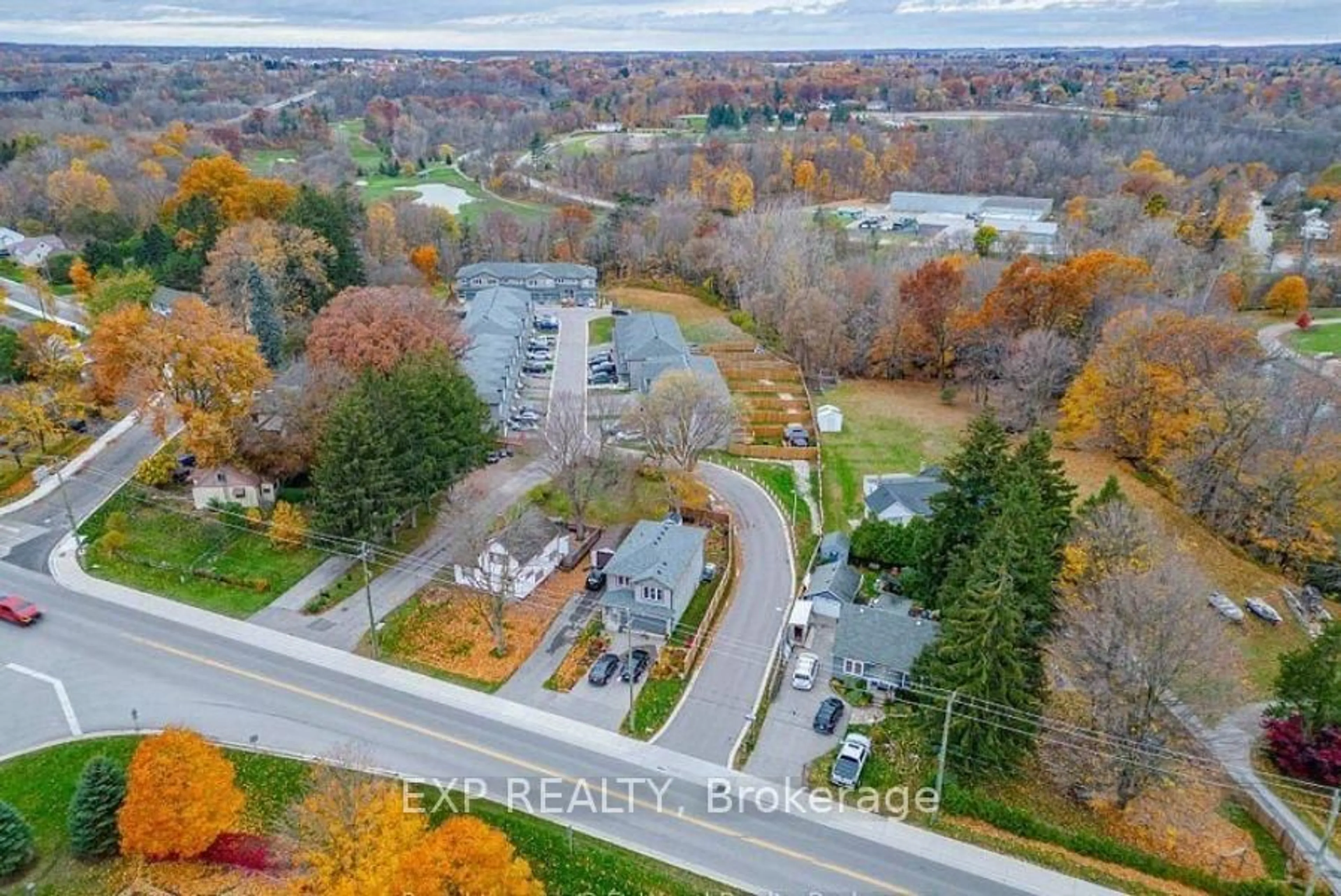 A pic from outside/outdoor area/front of a property/back of a property/a pic from drone, street for 61 Vienna Rd #14, Tillsonburg Ontario N4G 0J6