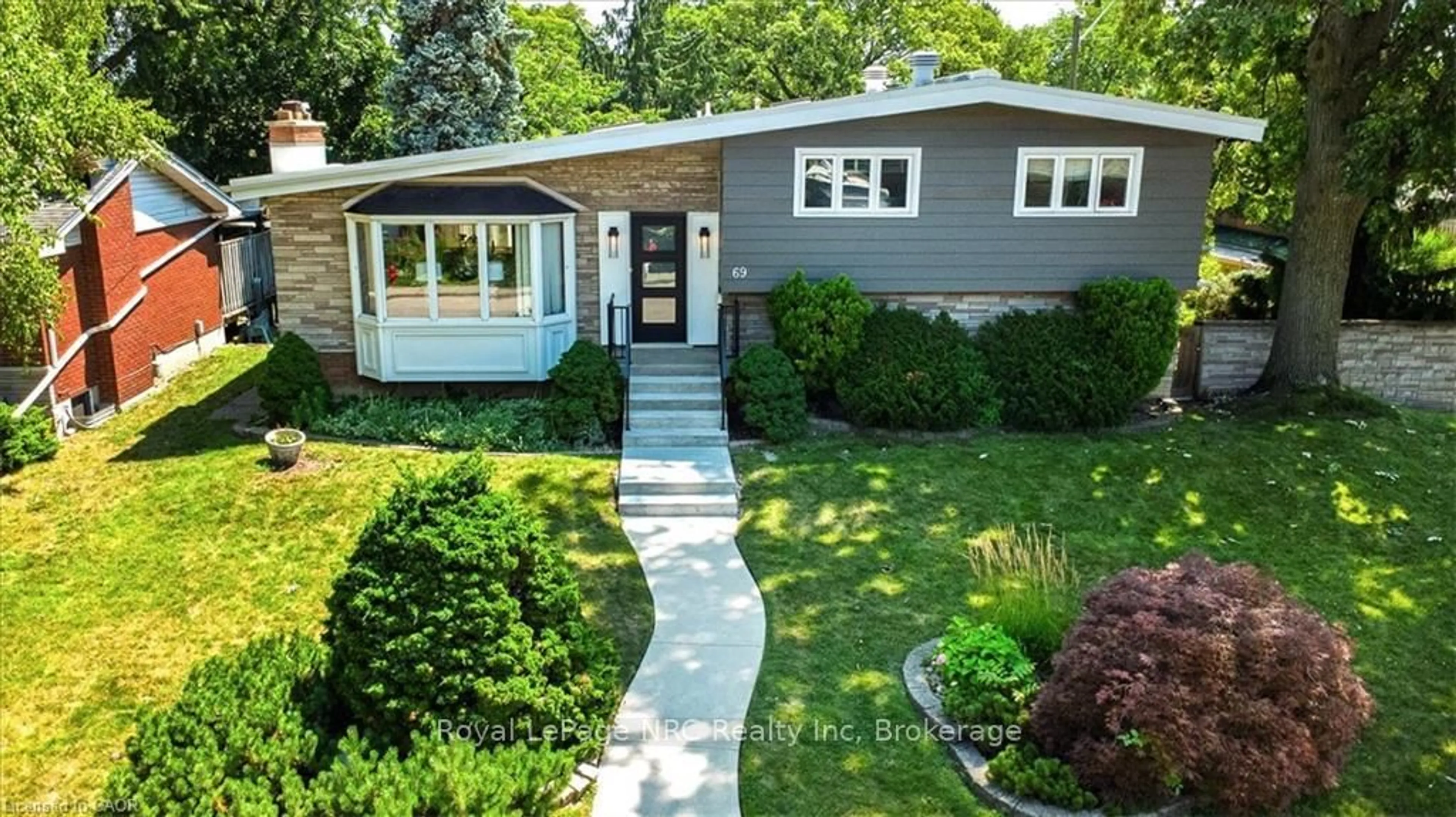 Home with vinyl exterior material, street for 69 Pleasant Ave, Hamilton Ontario L9C 4M8