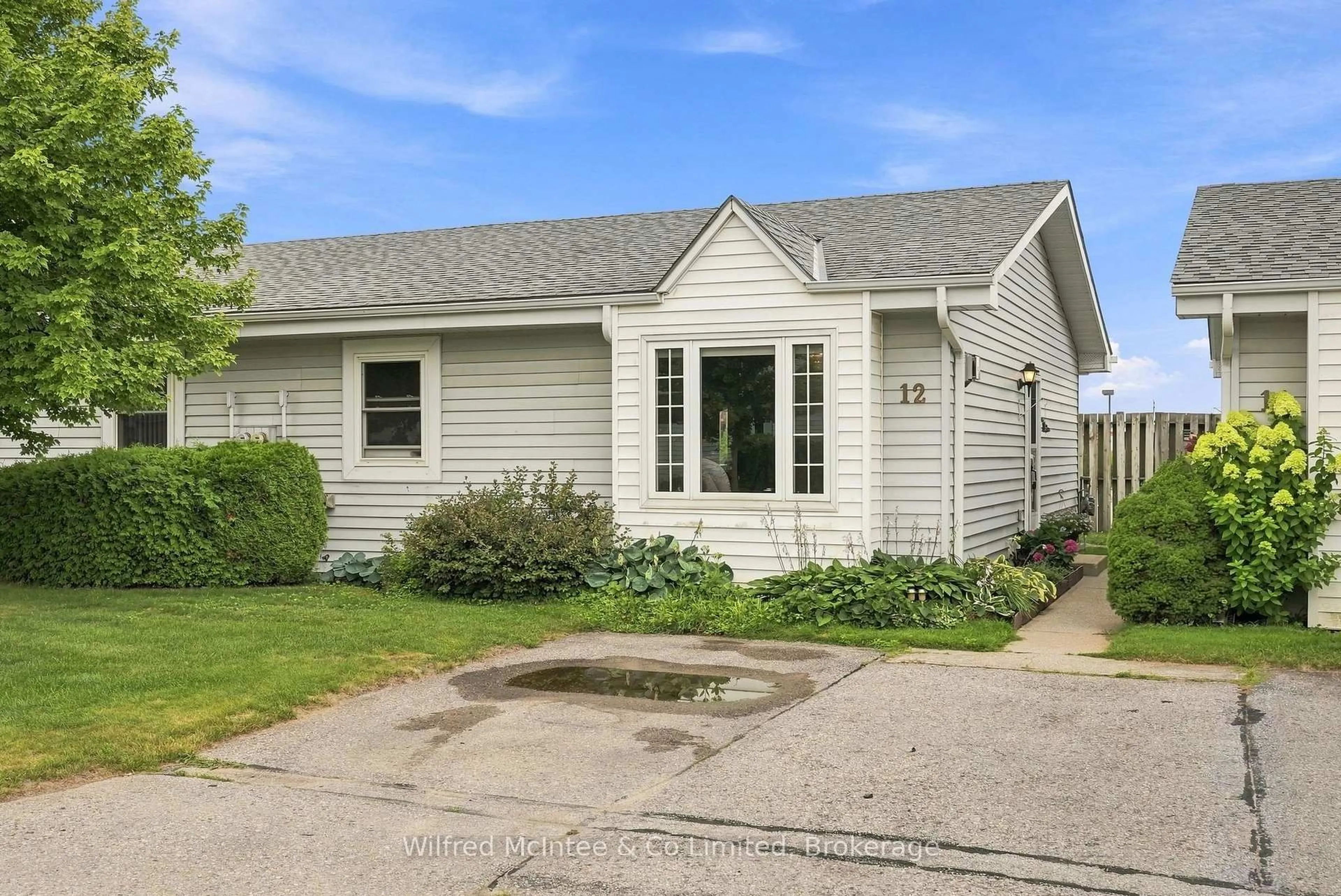 Home with vinyl exterior material, street for 303 Waterloo St #12, Saugeen Shores Ontario N0H 2C1