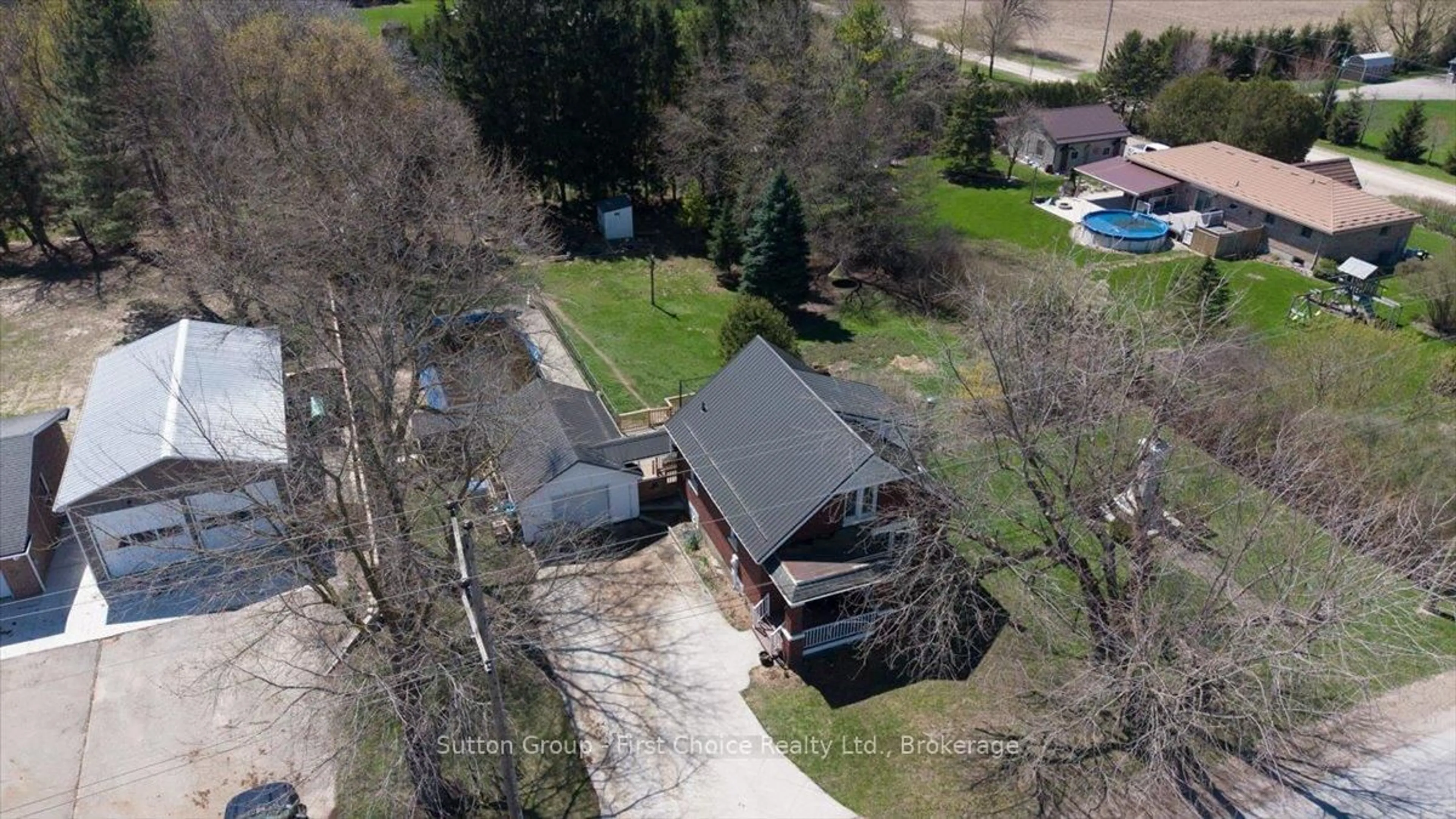 A pic from outside/outdoor area/front of a property/back of a property/a pic from drone, street for 1801 Perth Road 139 Rr 6 Rd, Perth South Ontario N4X 1C8
