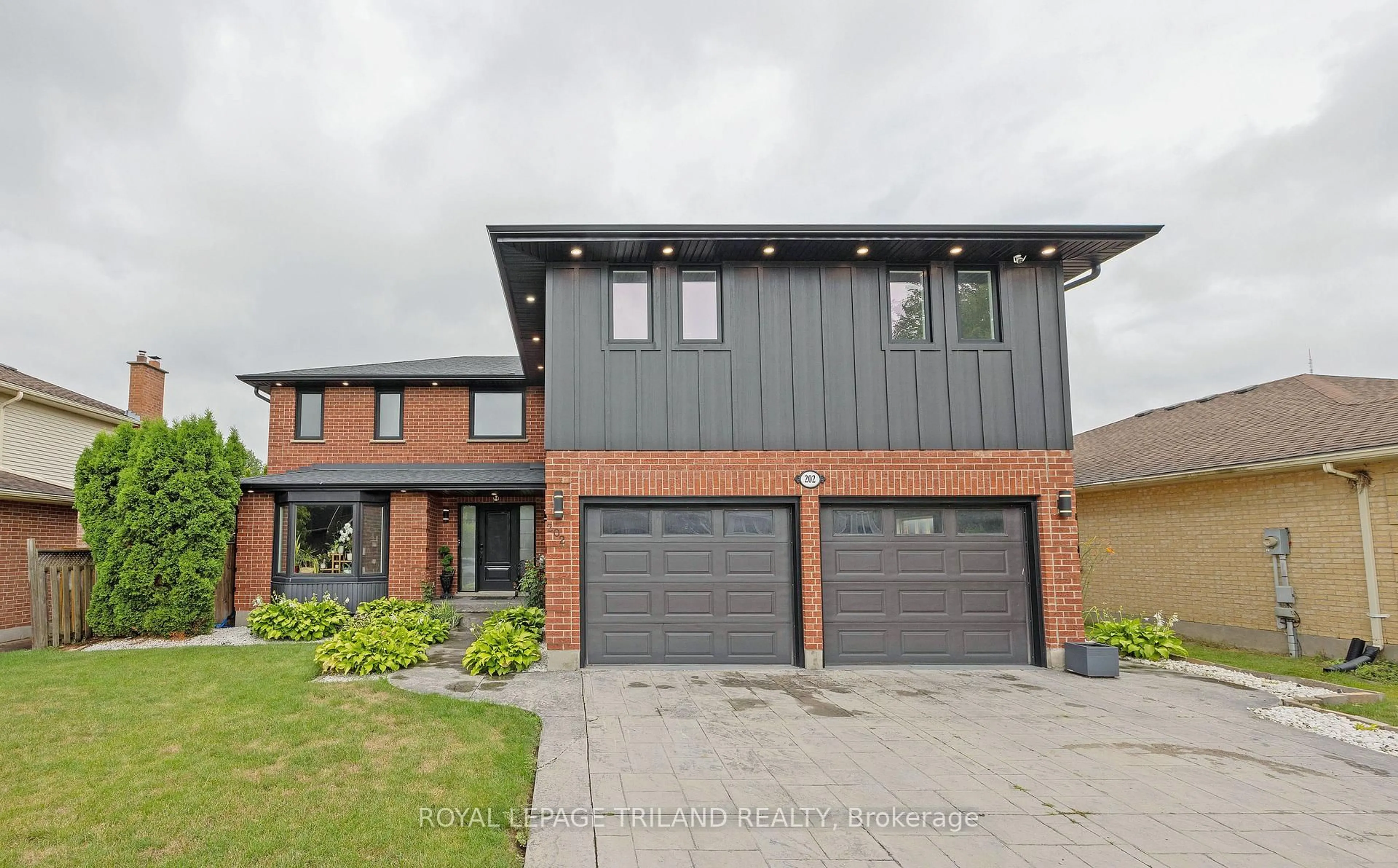 Home with brick exterior material, street for 202 Pine Valley Dr, London South Ontario N6J 4N7