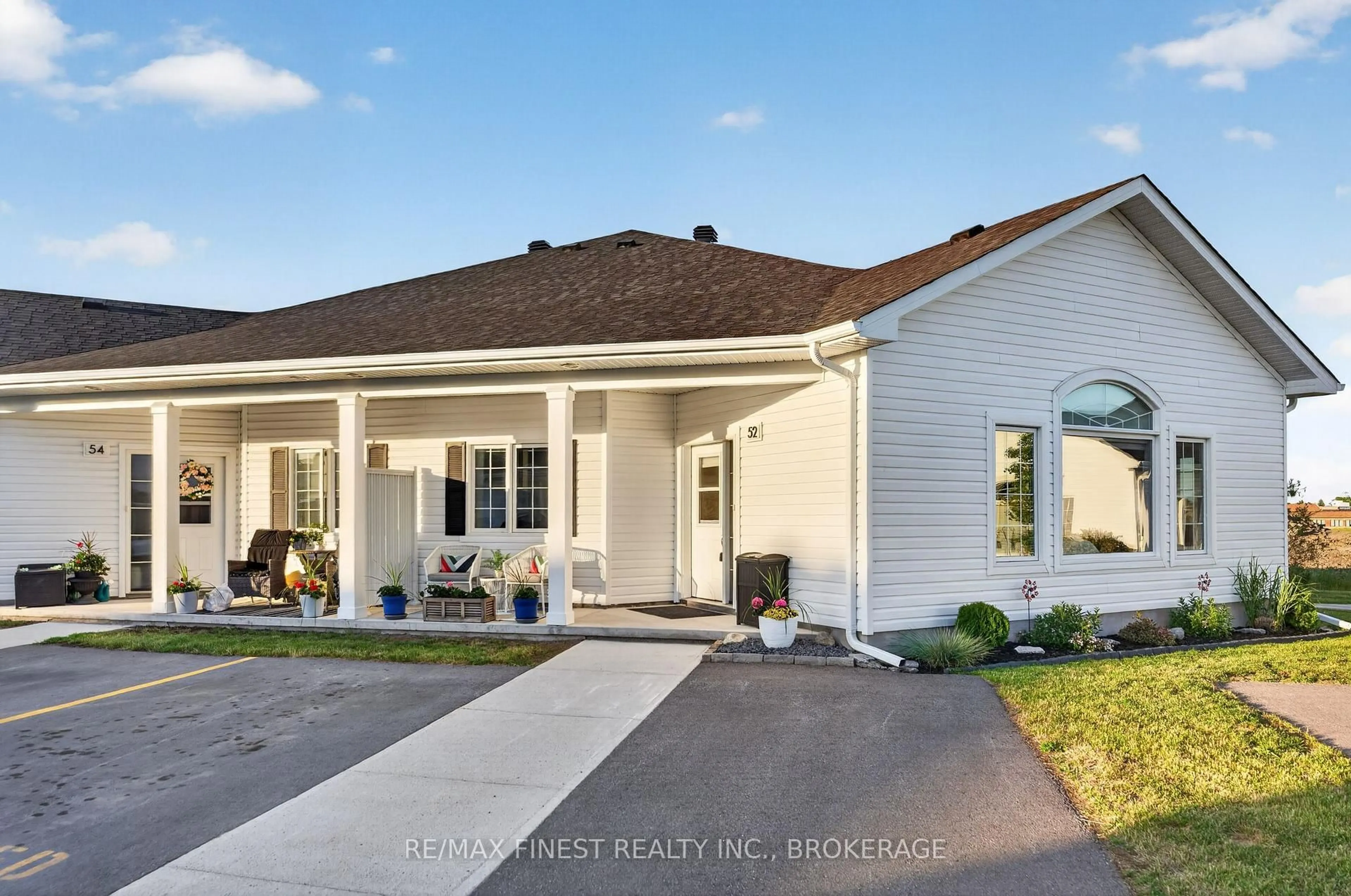Home with vinyl exterior material, street for 52 Lowry Pl, Loyalist Ontario K7N 0E2