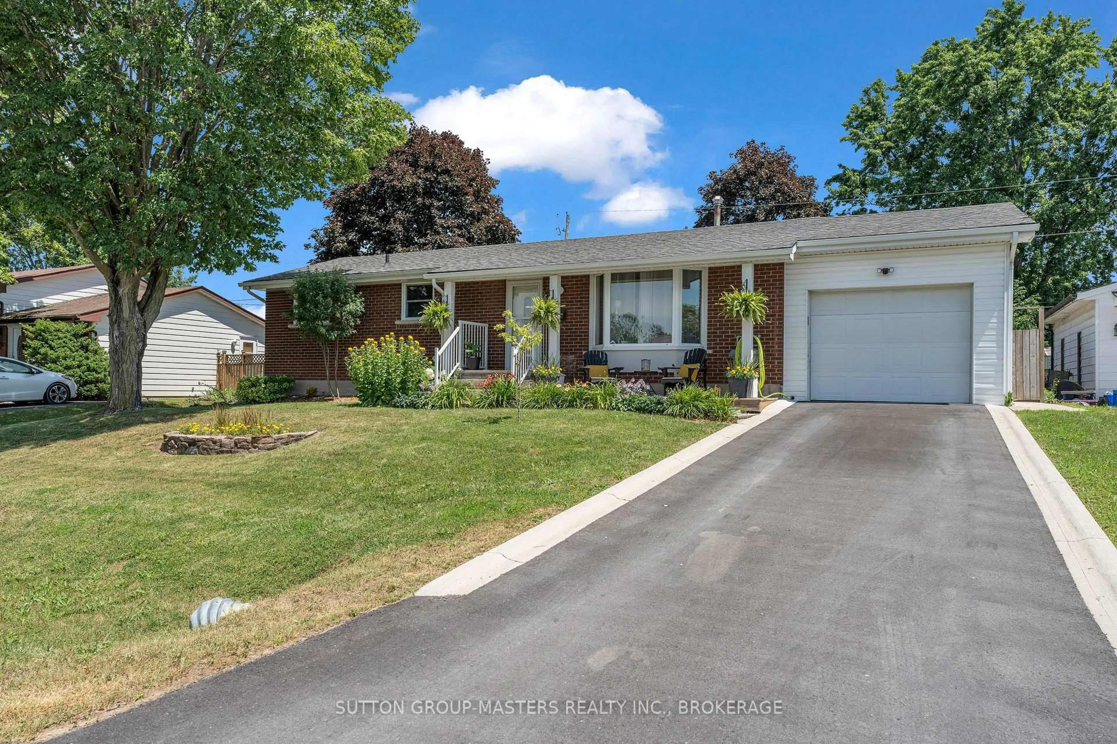 Home with vinyl exterior material, street for 11 Chesterfield Dr, Loyalist Ontario K7N 1M3