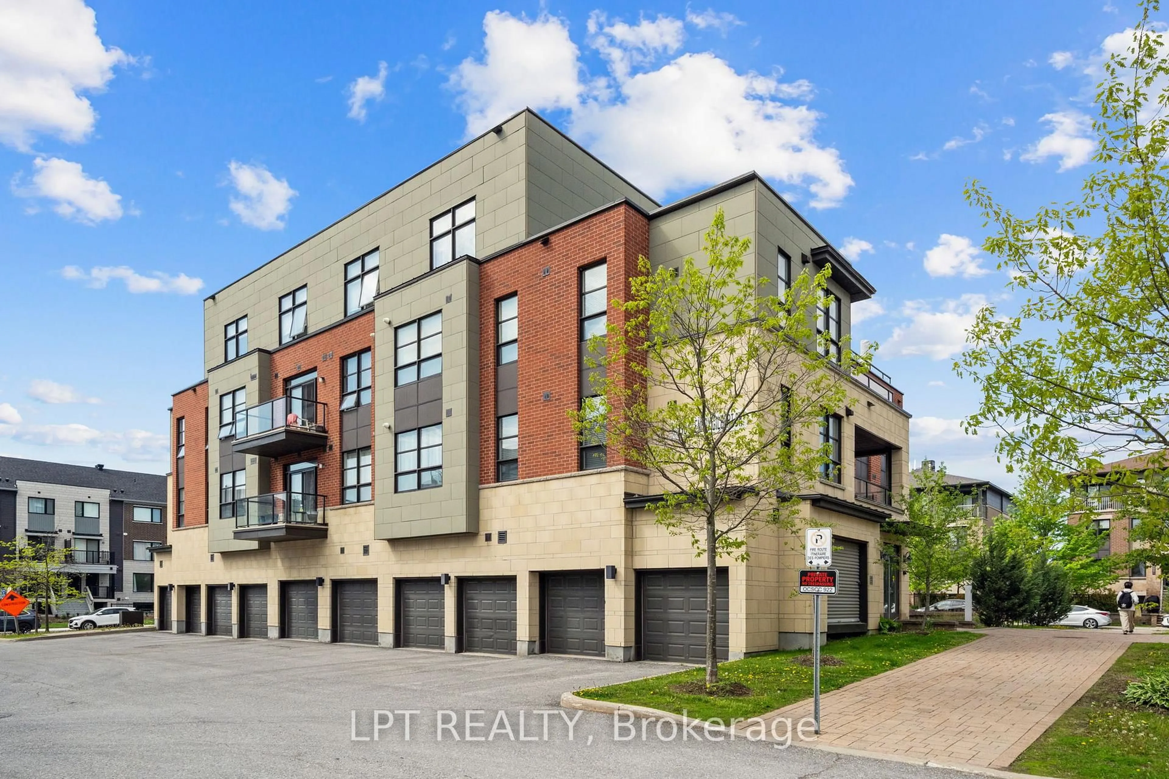 A pic from outside/outdoor area/front of a property/back of a property/a pic from drone, street for 298 Glenroy Gilbert Dr #301, Ottawa Ontario K2J 5W2