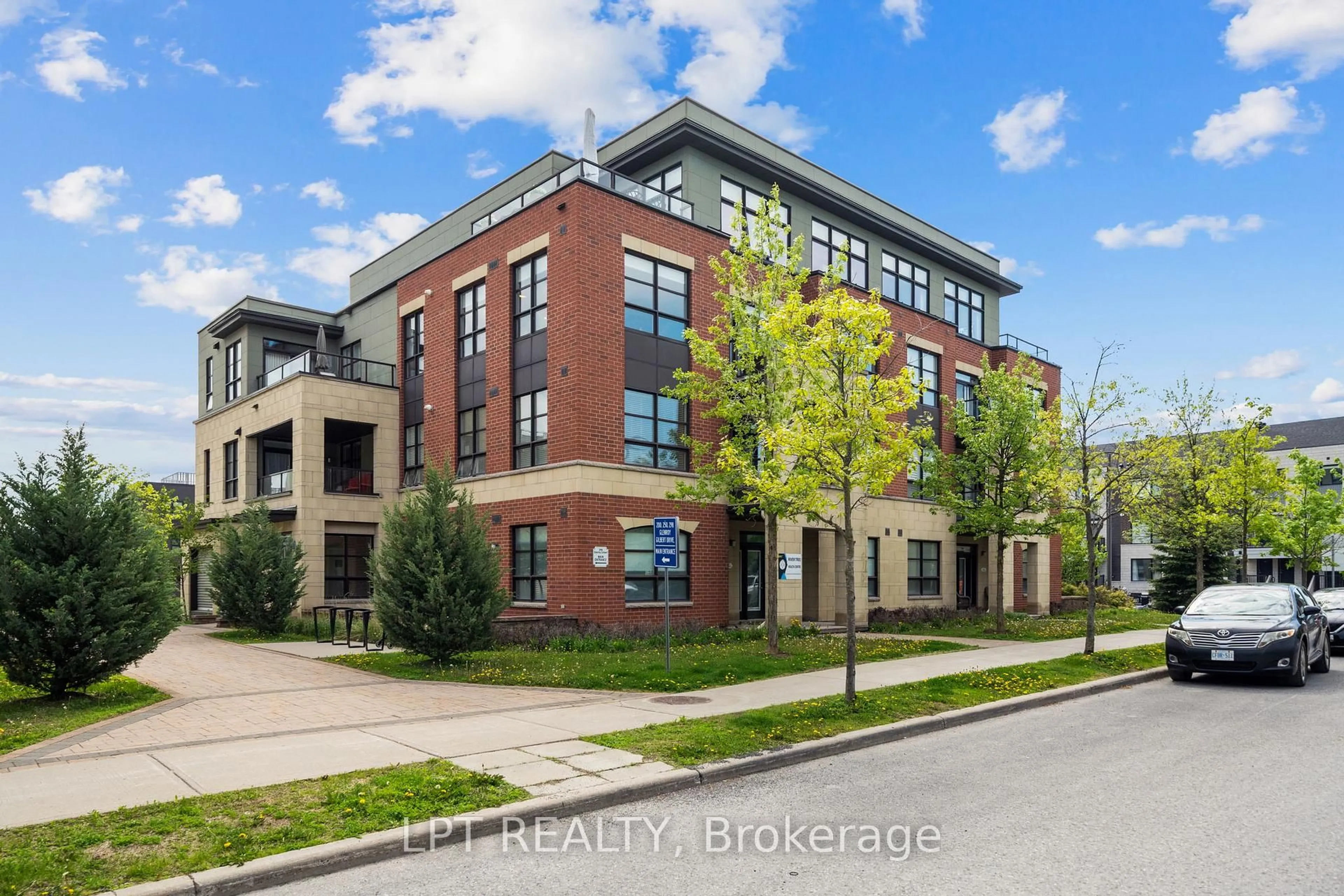 Home with brick exterior material, street for 298 Glenroy Gilbert Dr #301, Ottawa Ontario K2J 5W2